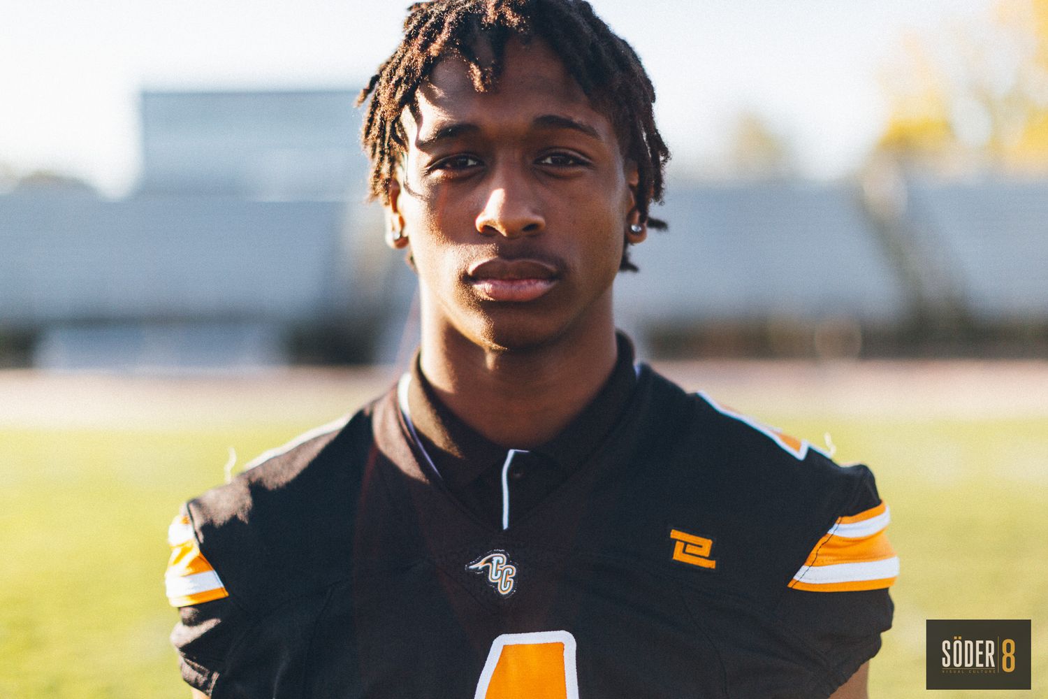 football player portrait of young man in jersey