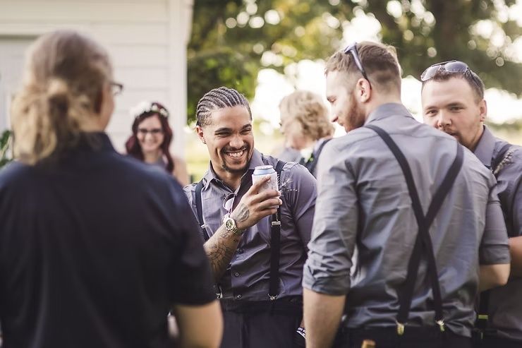 wedding party drinking beer and laughing at diamond oak events