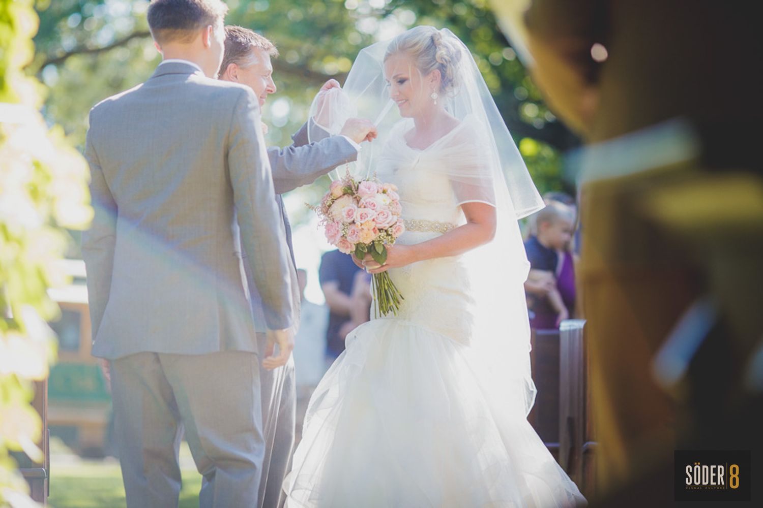 bride walking to altar in clear lake iowa wedding