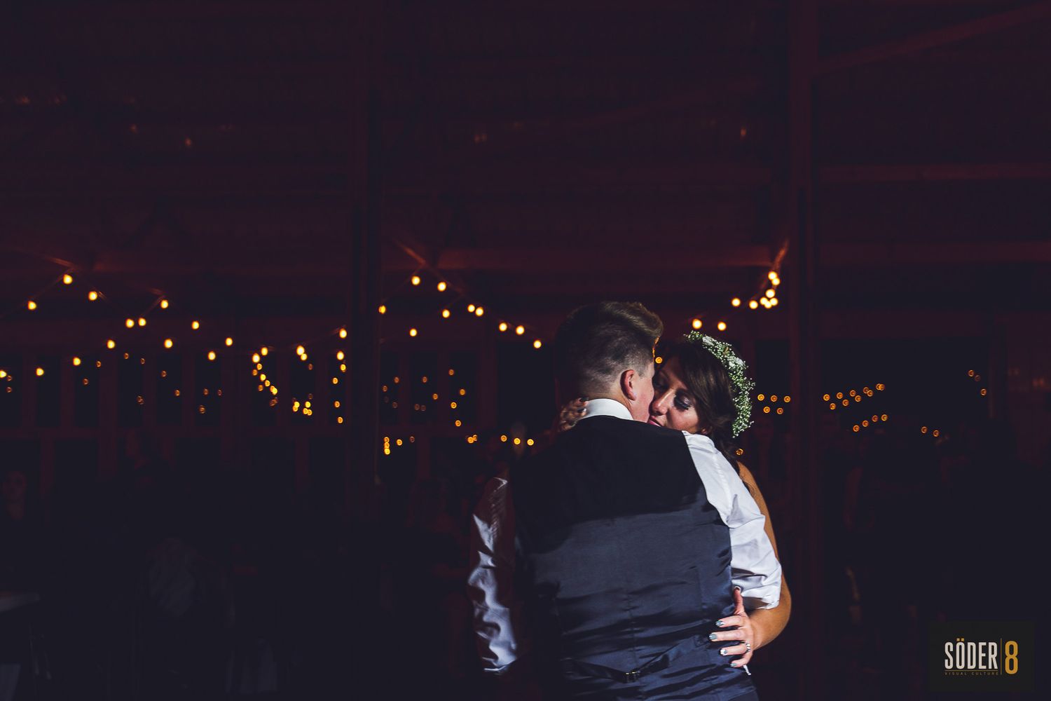 same sex bride and groom dancing