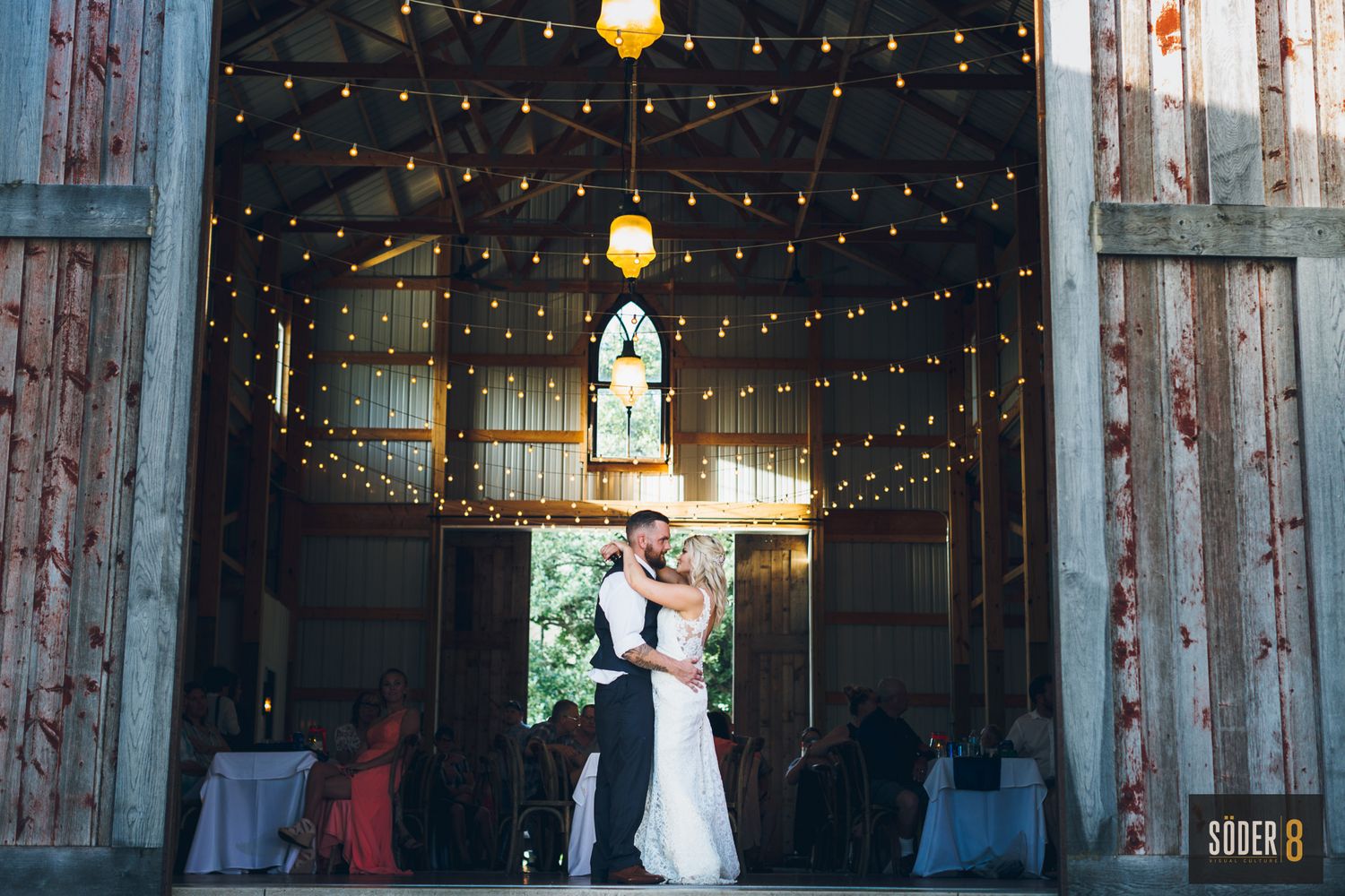 bride and groom dancing at barn wedding