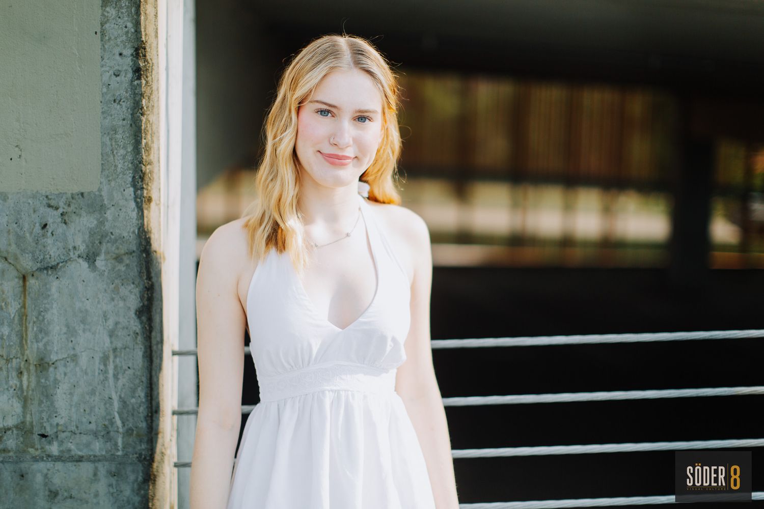 High school senior girl in Cedar Falls parking garage
 for senior photo session.
