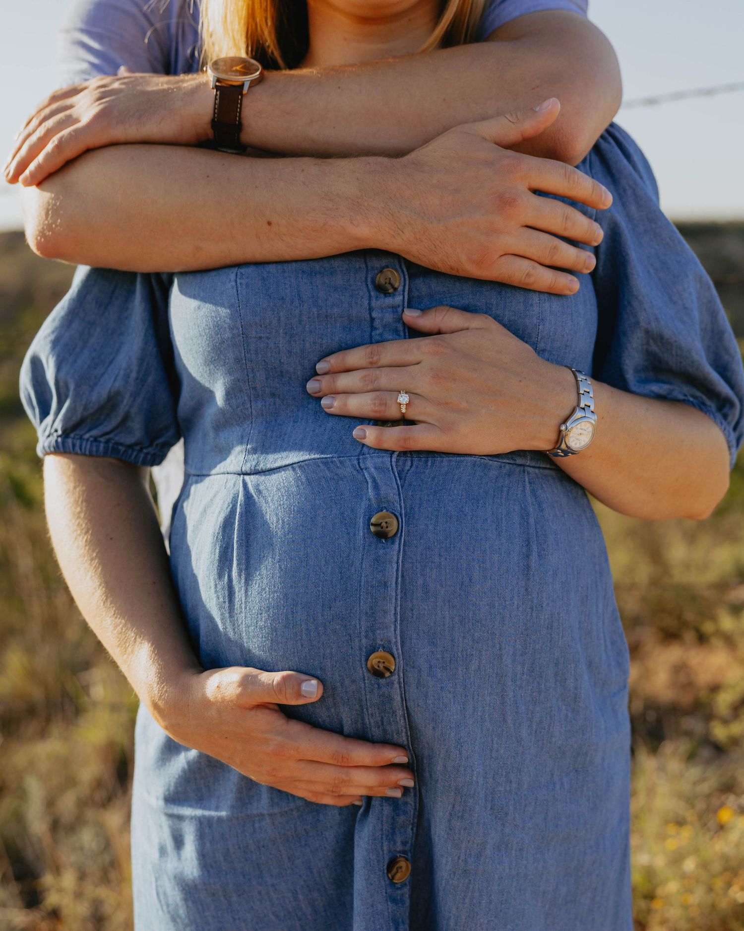 Multiple close-up shots showing hands gently resting on a denim dress with buttons during a maternity photo shoot at sunset.