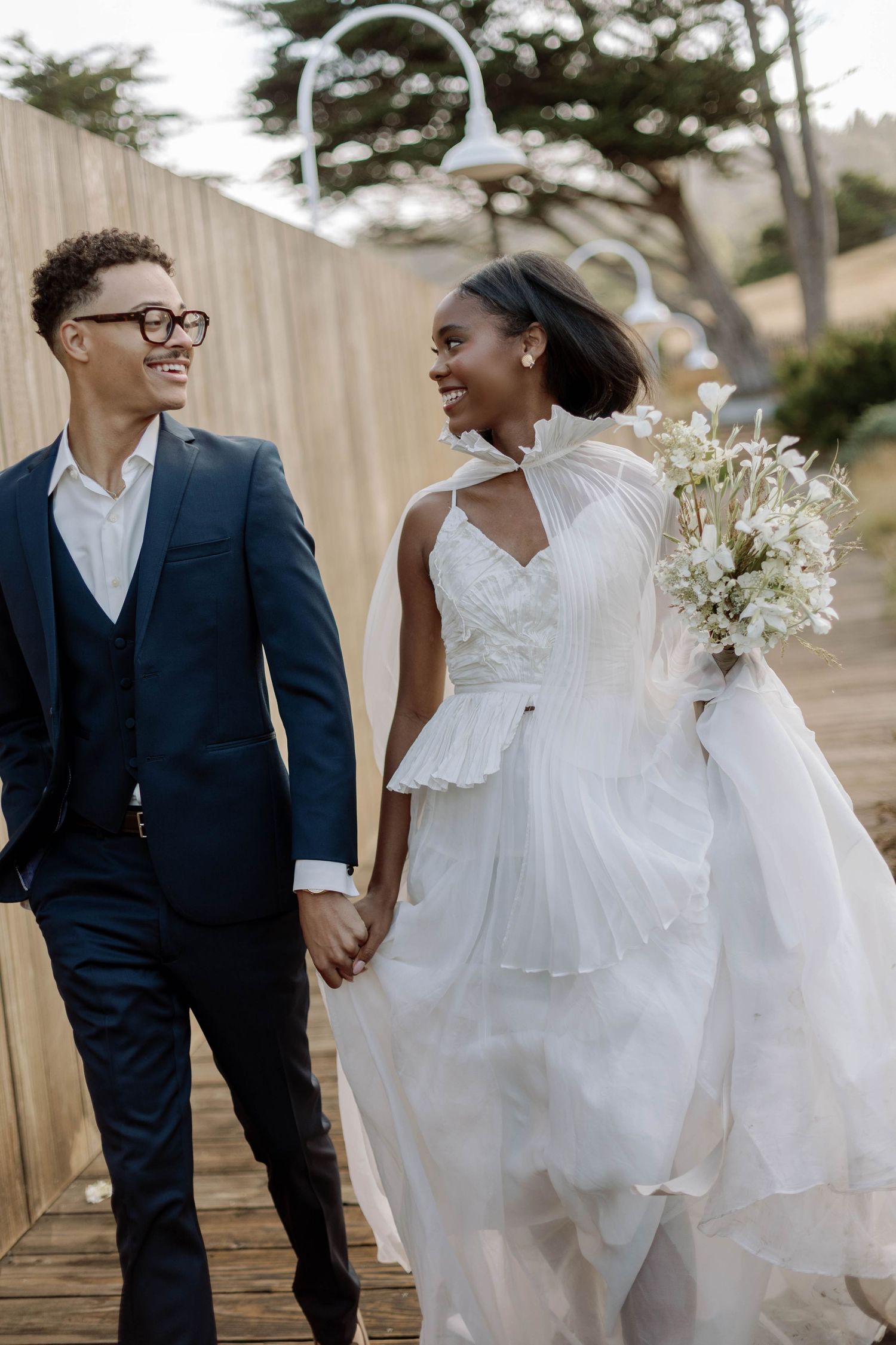 Happy newlyweds share joyful moments together in a series of candid wedding photos showing love and laughter.