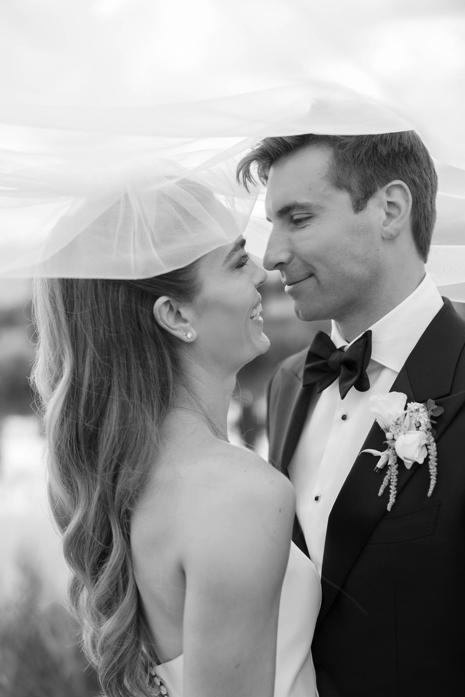 Romantic black and white close-up portraits capture intimate wedding day moments.