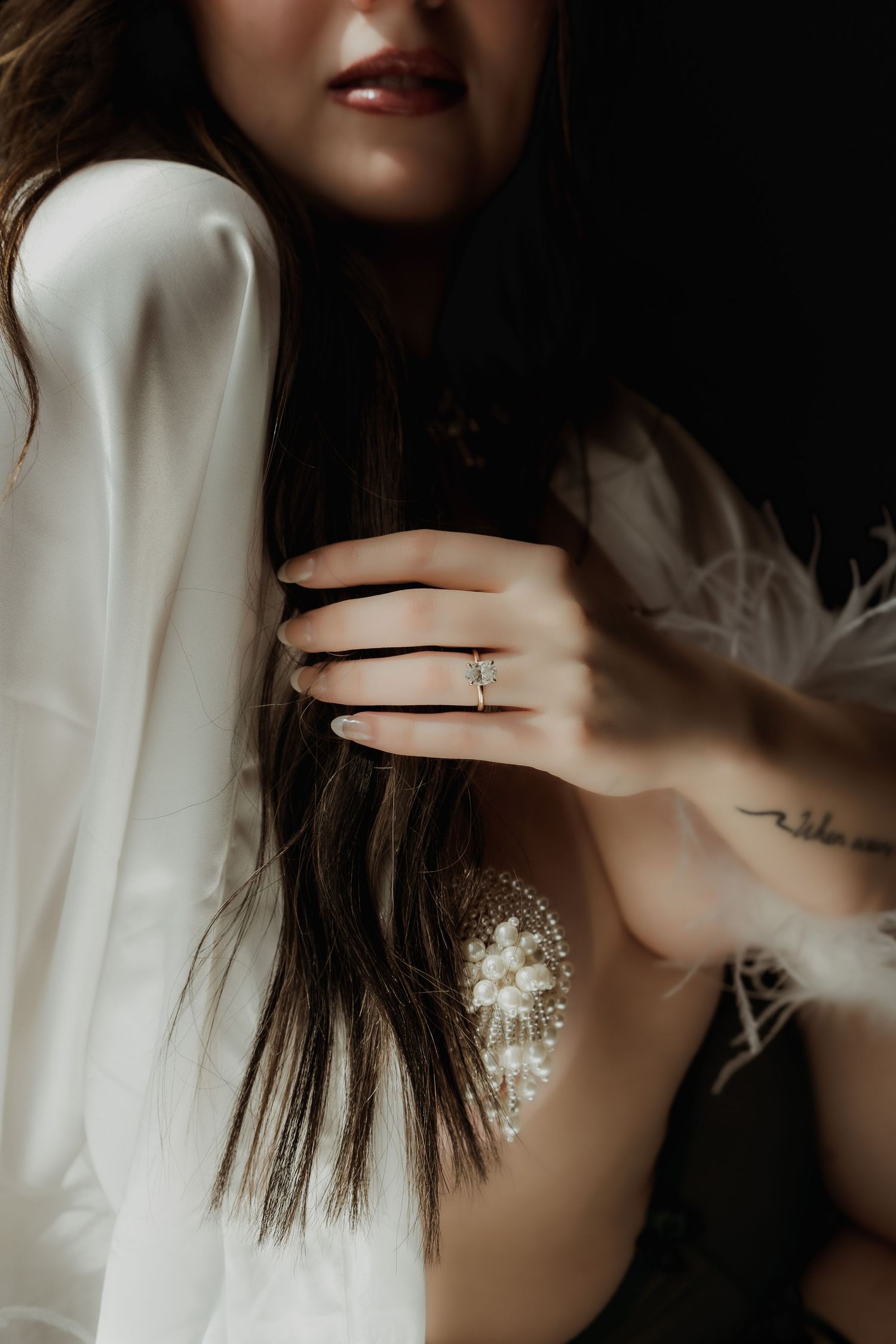 Inclusive bridal boudoir photography session in Grand Rapids featuring a confident woman in a body-positive studio environment