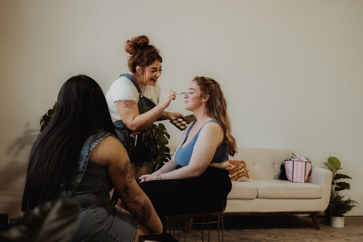 Inclusive luxury boudoir photography session in Grand Rapids featuring the best team of professional hairstylists and makeup artists