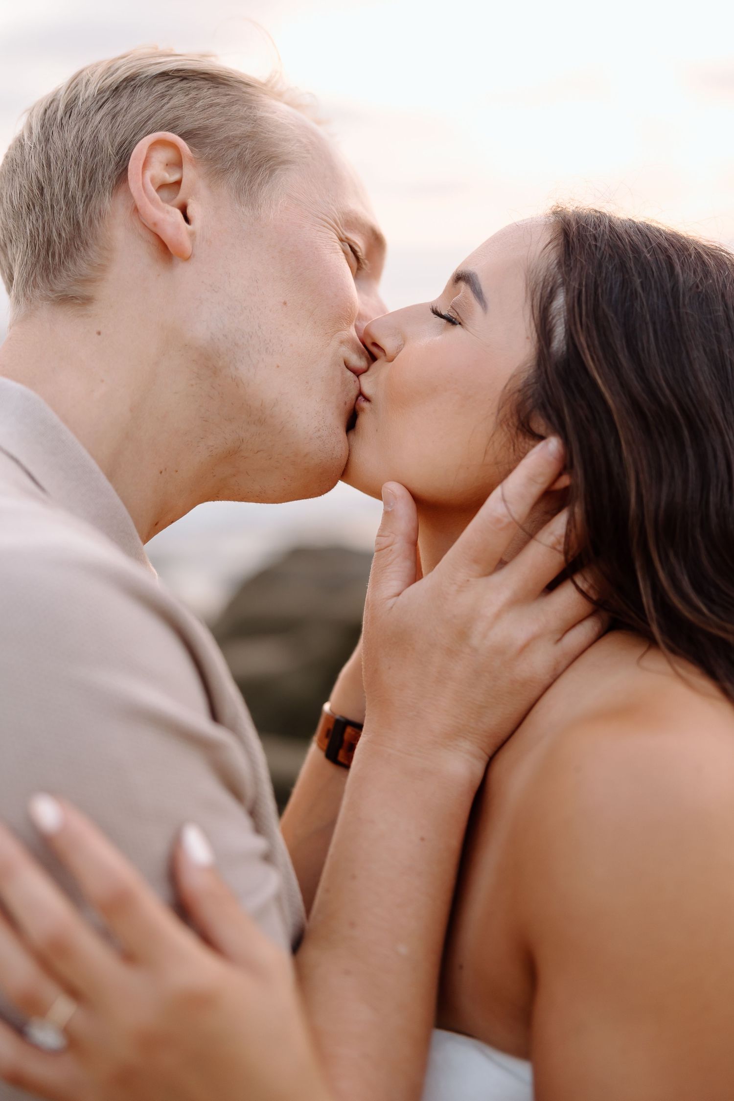 True-to-color couple’s portrait on the Potomac River shoreline at Gravelly Point, Arlington