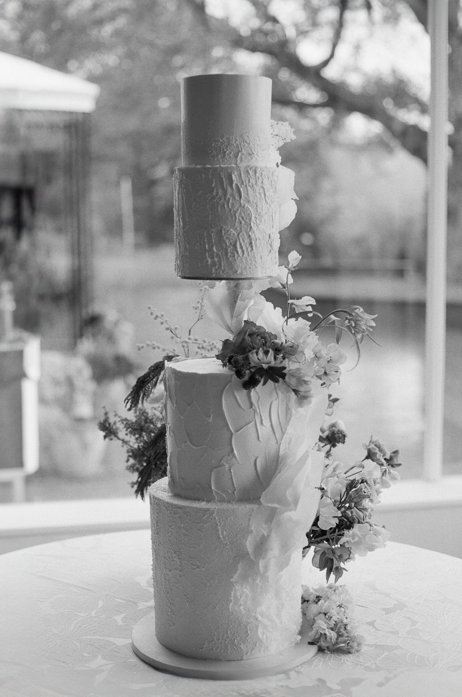 Editorial-style bridal shoes photographed on 35mm film with soft shadows