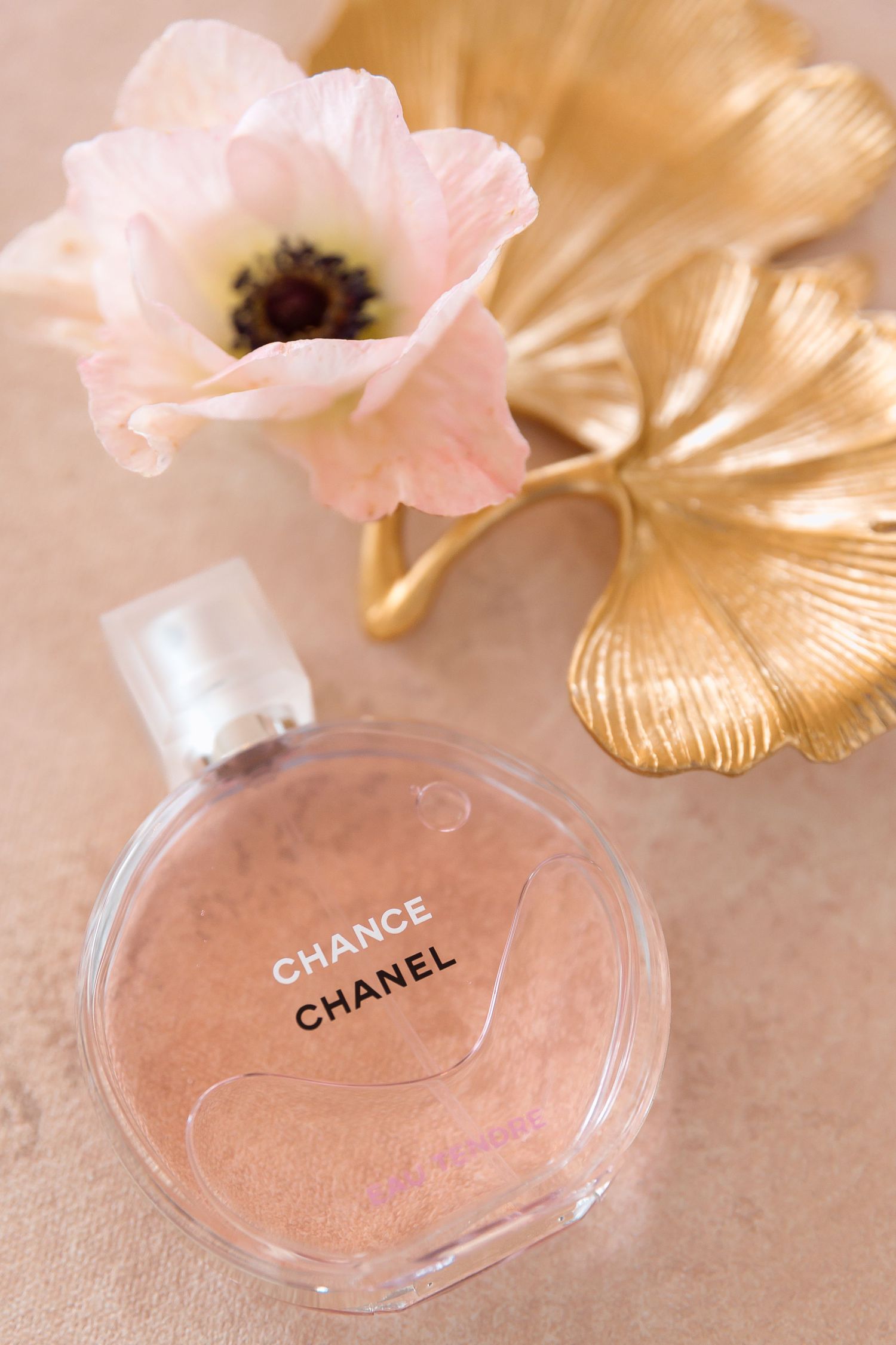Bride’s perfume bottle detail shot on 35mm film with editorial styling