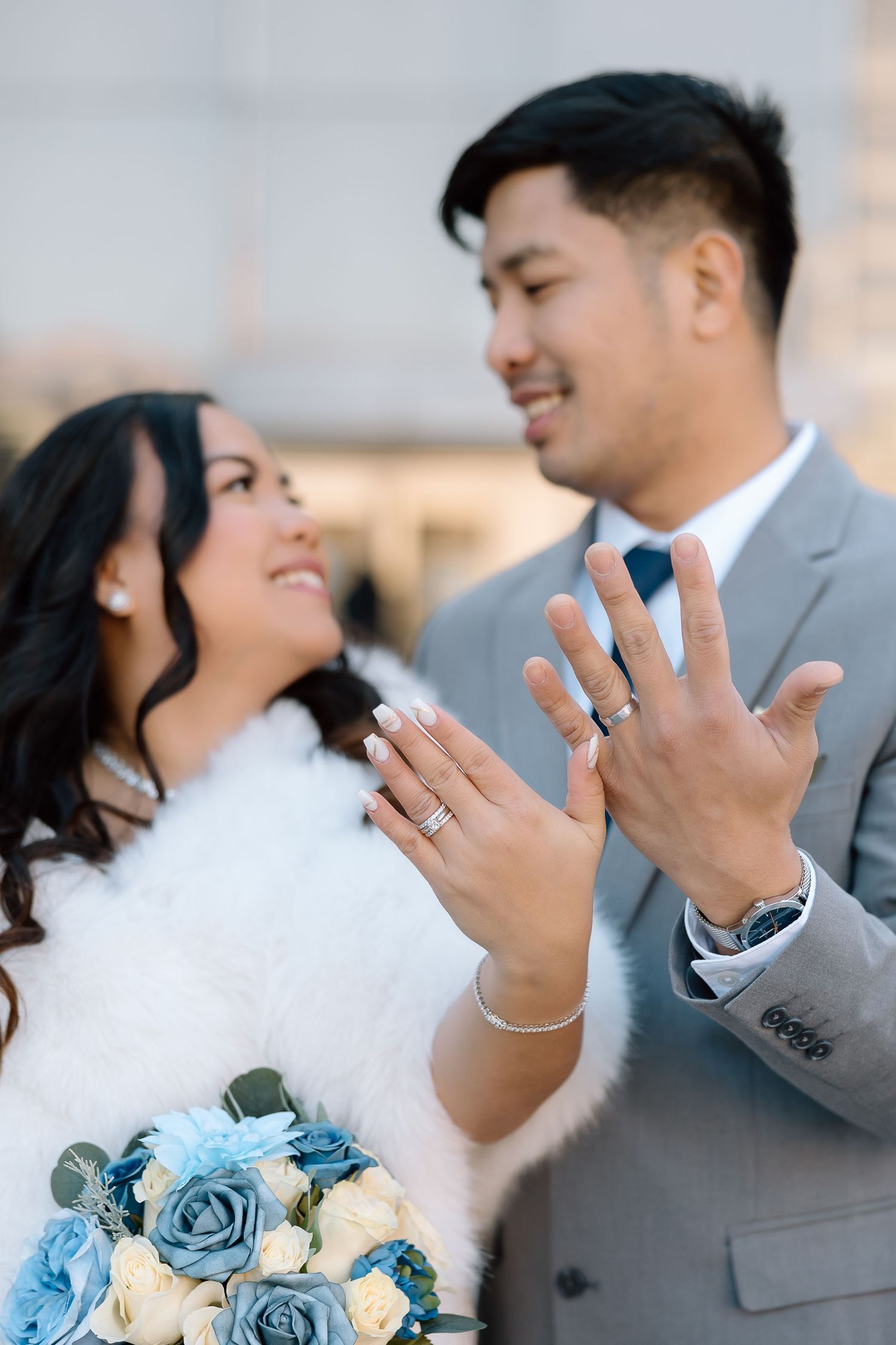 Couple exchanging rings during a small elopement ceremony on the National Mall lawn