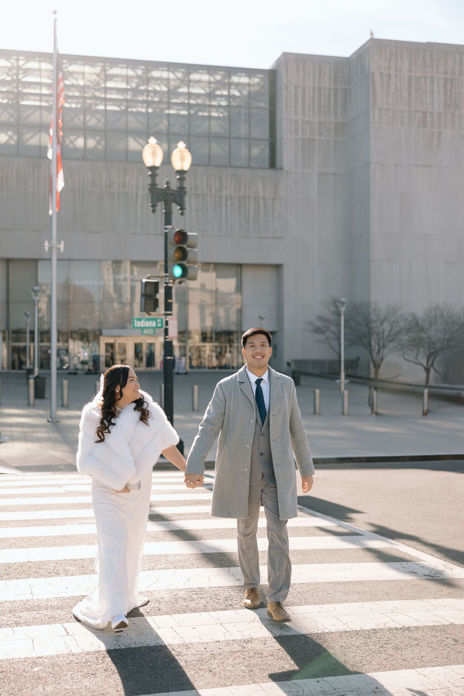 Elopement photos featuring the Reflecting Pool and Washington Monument in soft morning light