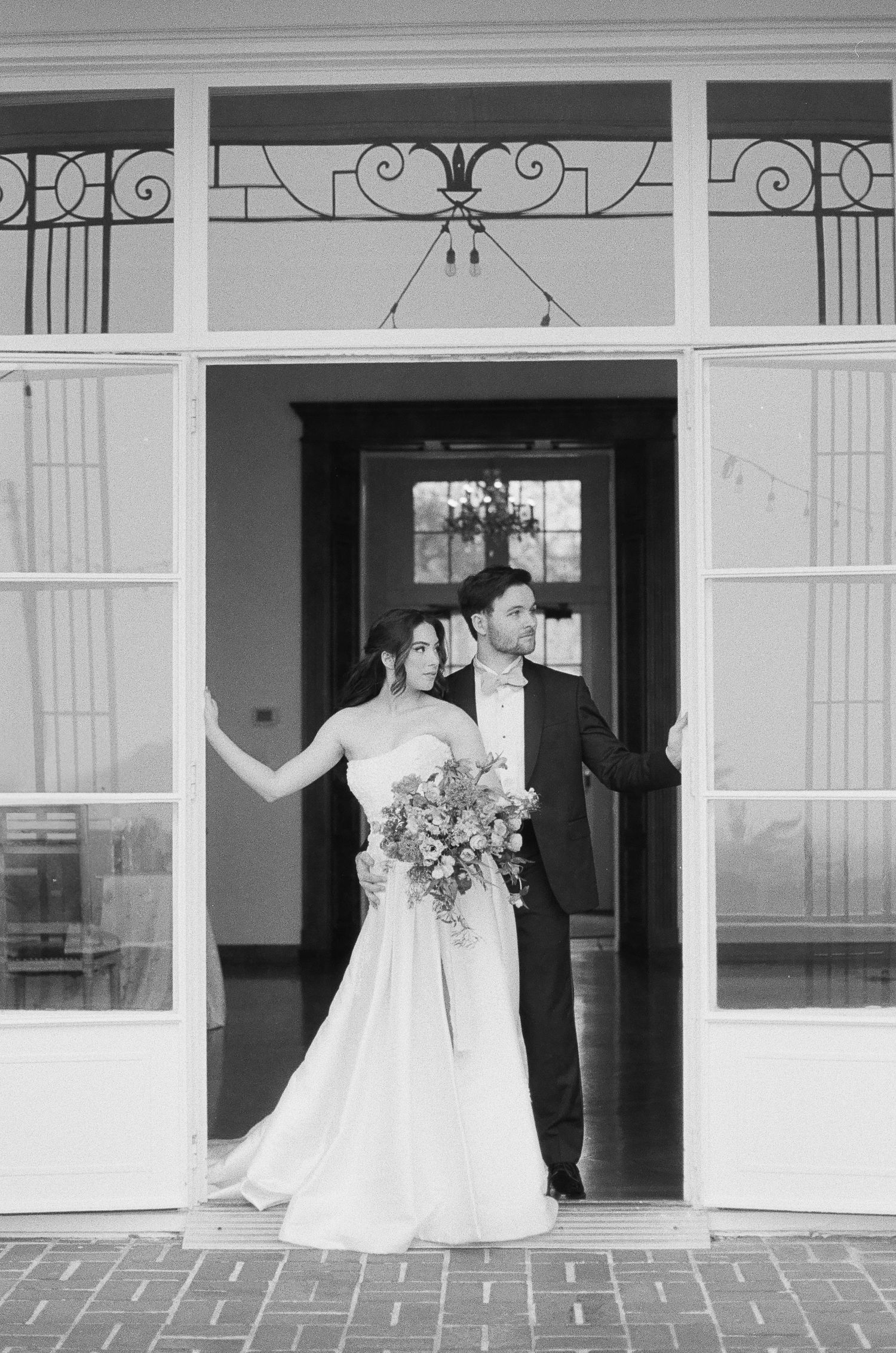 Editorial-style bridal shoes photographed on 35mm film with soft shadows