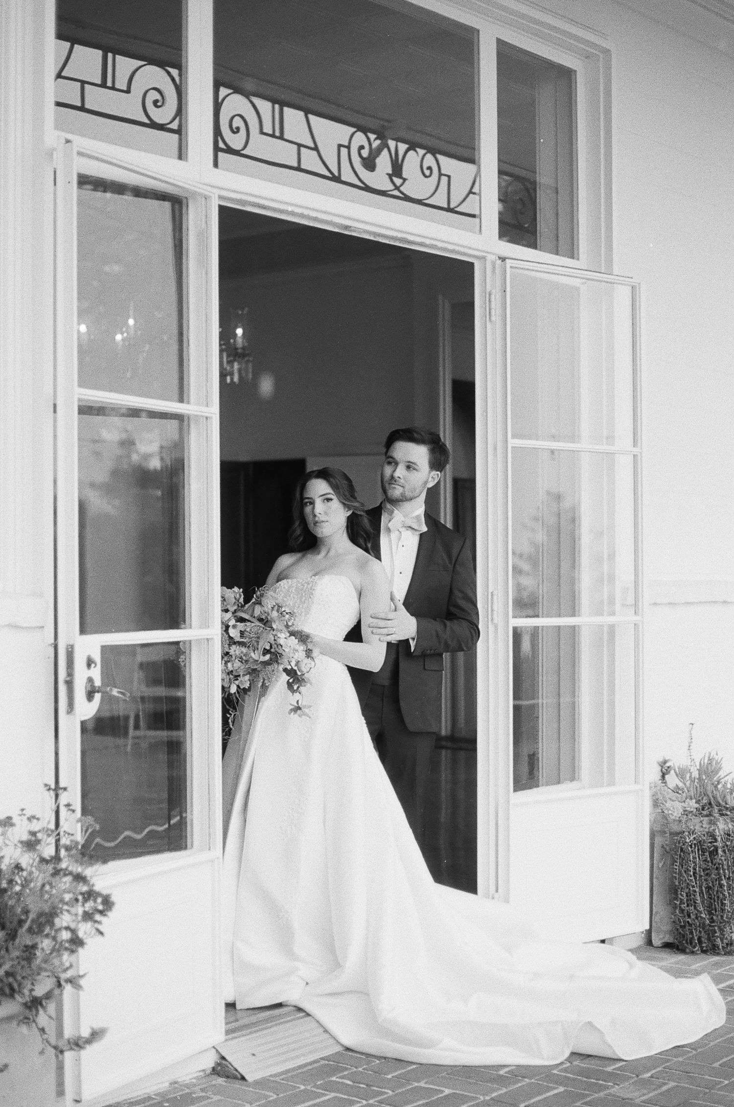 Editorial-style bridal shoes photographed on 35mm film with soft shadows