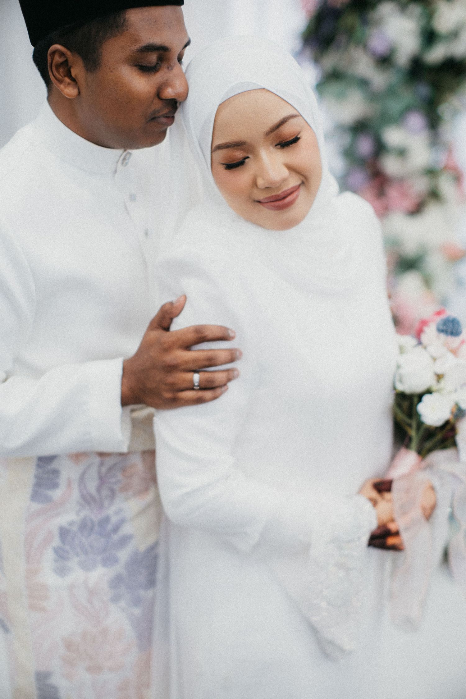 A romantic wedding photography sequence shows a couple in white traditional attire sharing intimate moments together.