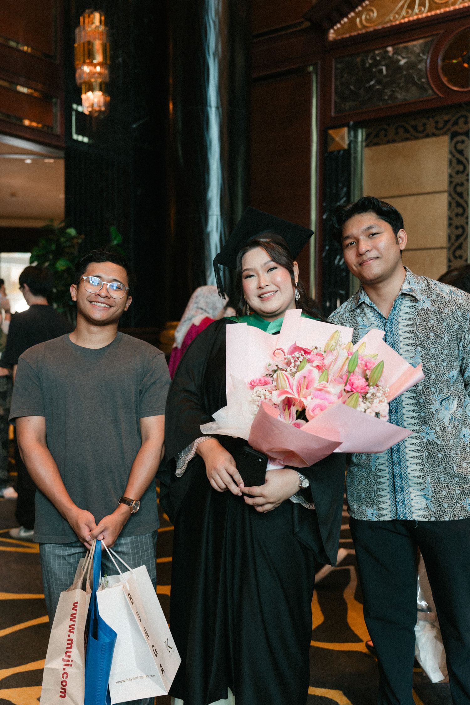 A collage of people holding flower bouquets and smiling in an indoor venue.