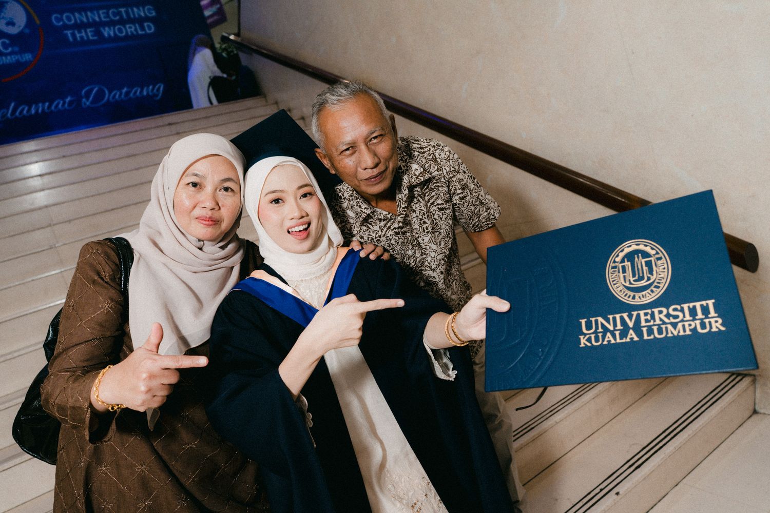 A collage of candid graduation celebration moments showing people in academic regalia and hijabs sharing joyful expressions.