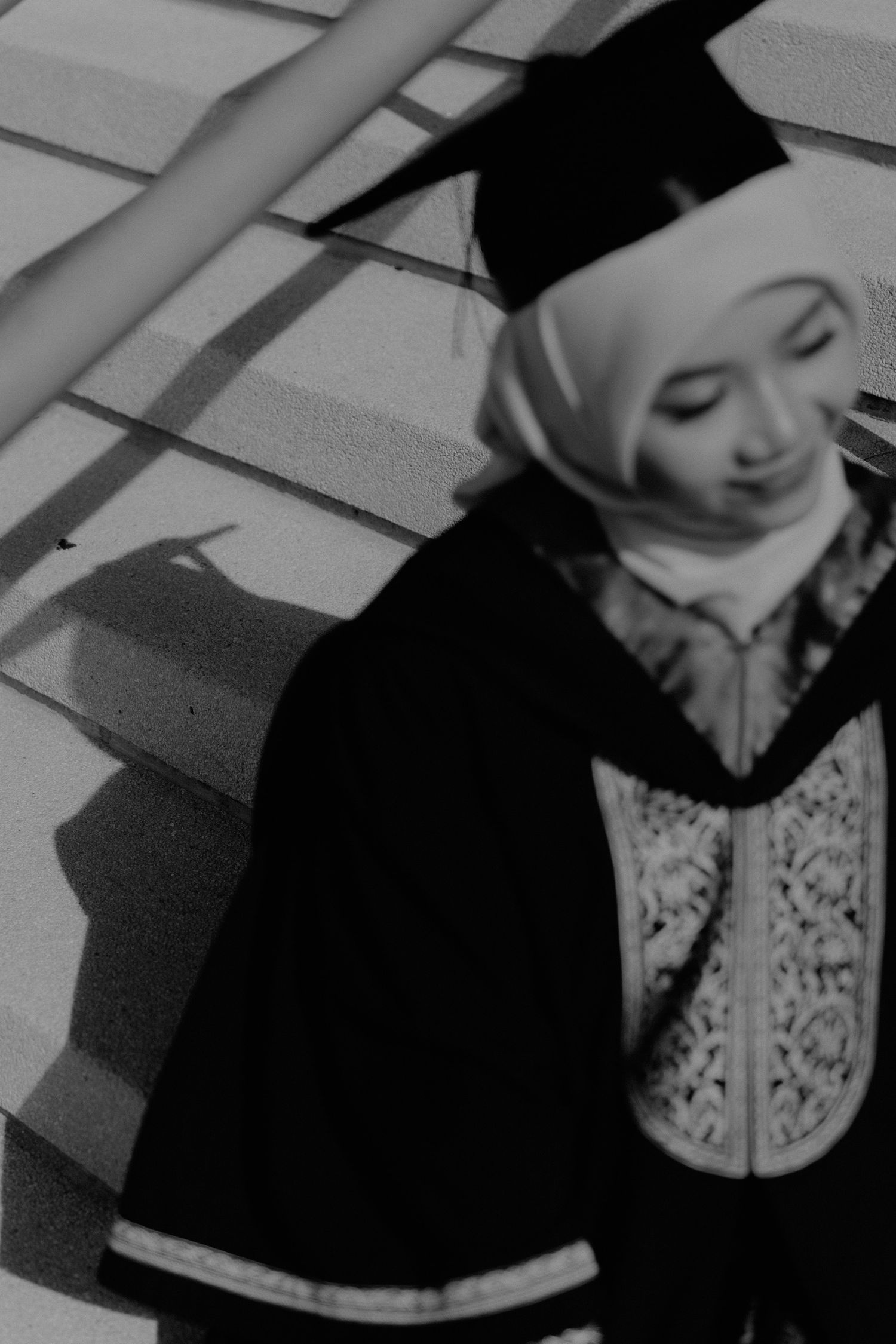 A black and white artistic photo series showing abstract close-up details of decorative patterns and shadows.