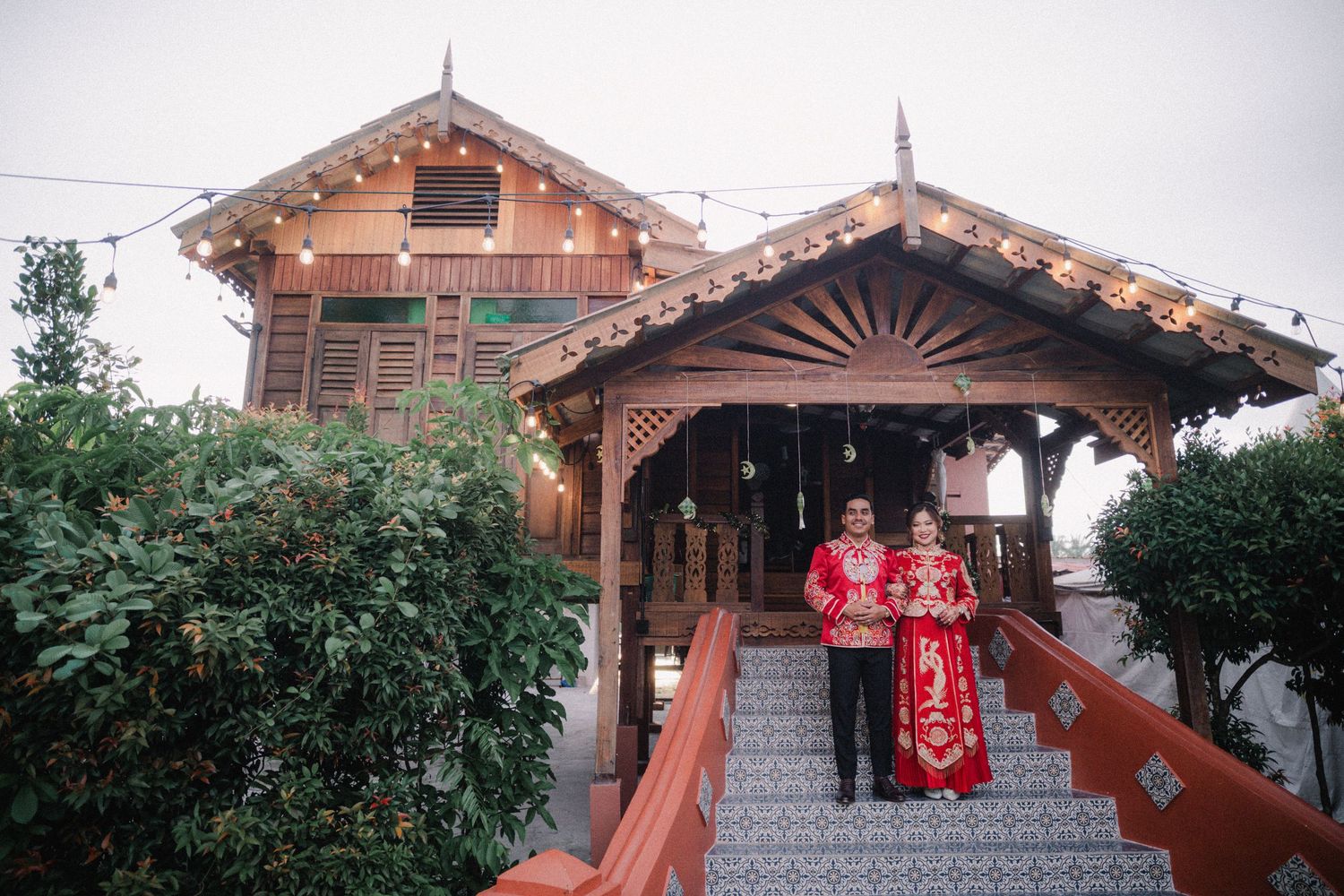 Traditional Chinese-style wooden temple entrance with ornate roof details and stone steps leading to entrance.