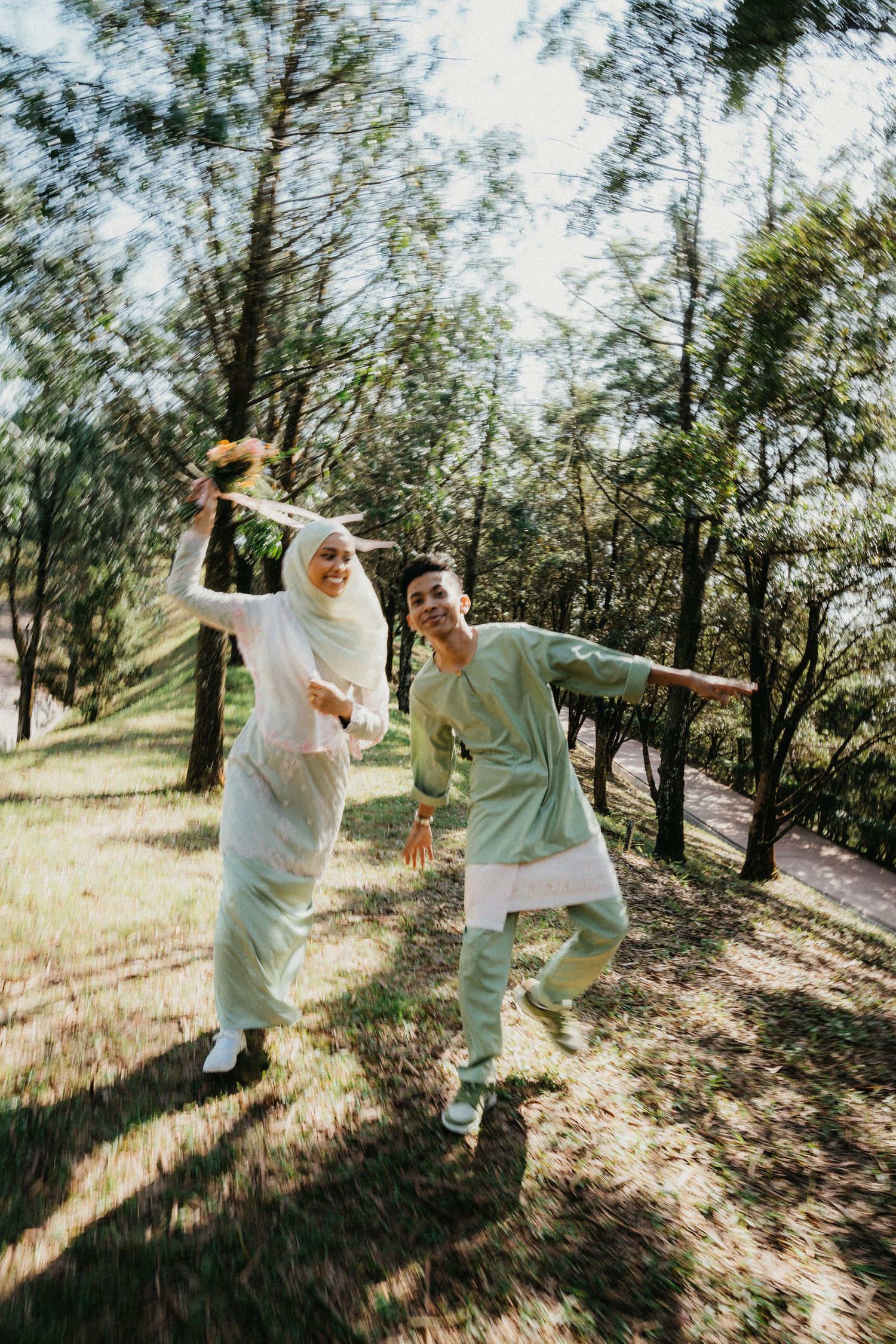 A series of playful dance poses captured in a sun-dappled forest setting with soft natural lighting.
