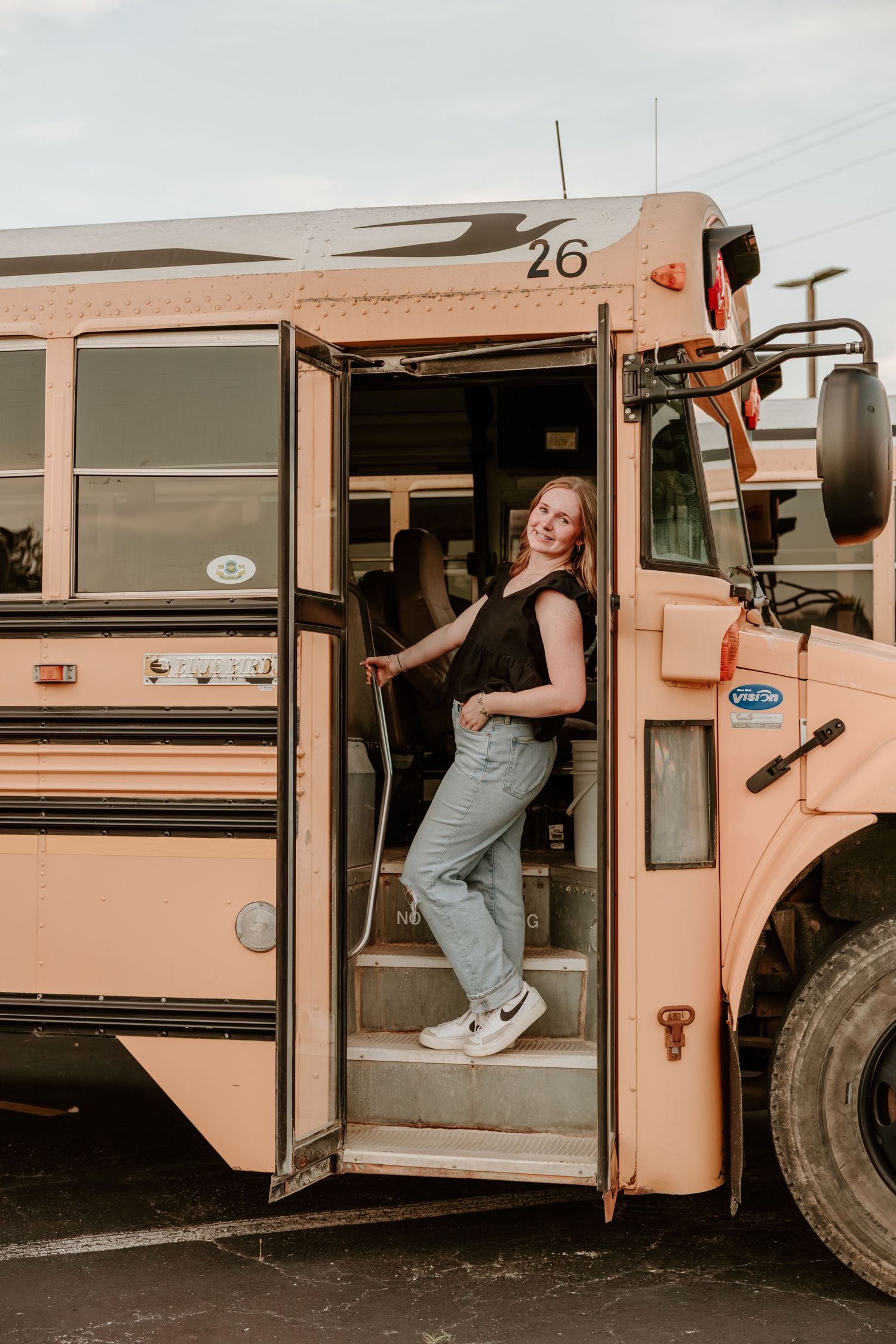 A series of photos showing someone climbing into a peach-colored school bus in casual clothing and sneakers.
