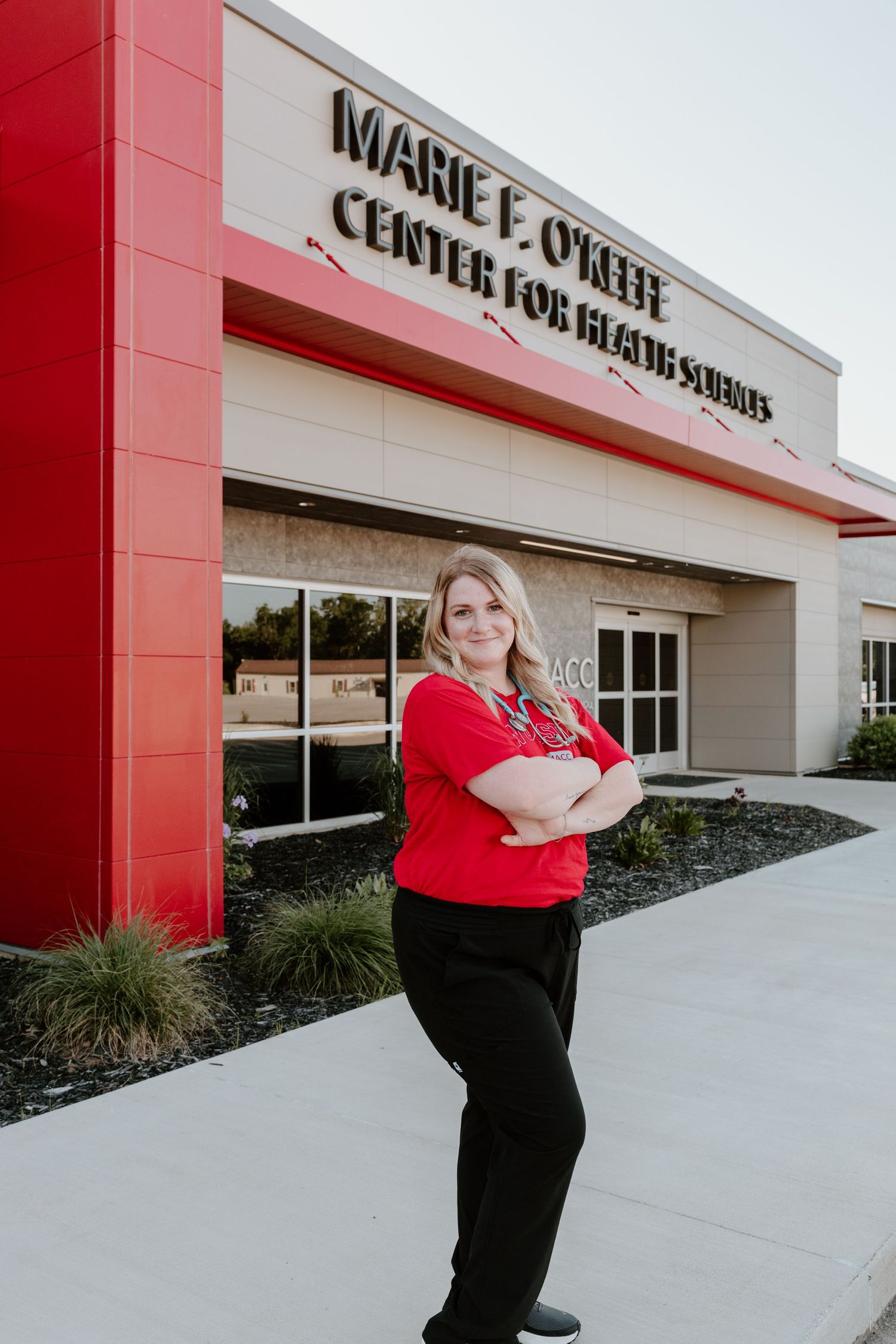 A series of retail storefront exterior views with red trim along the building facade.