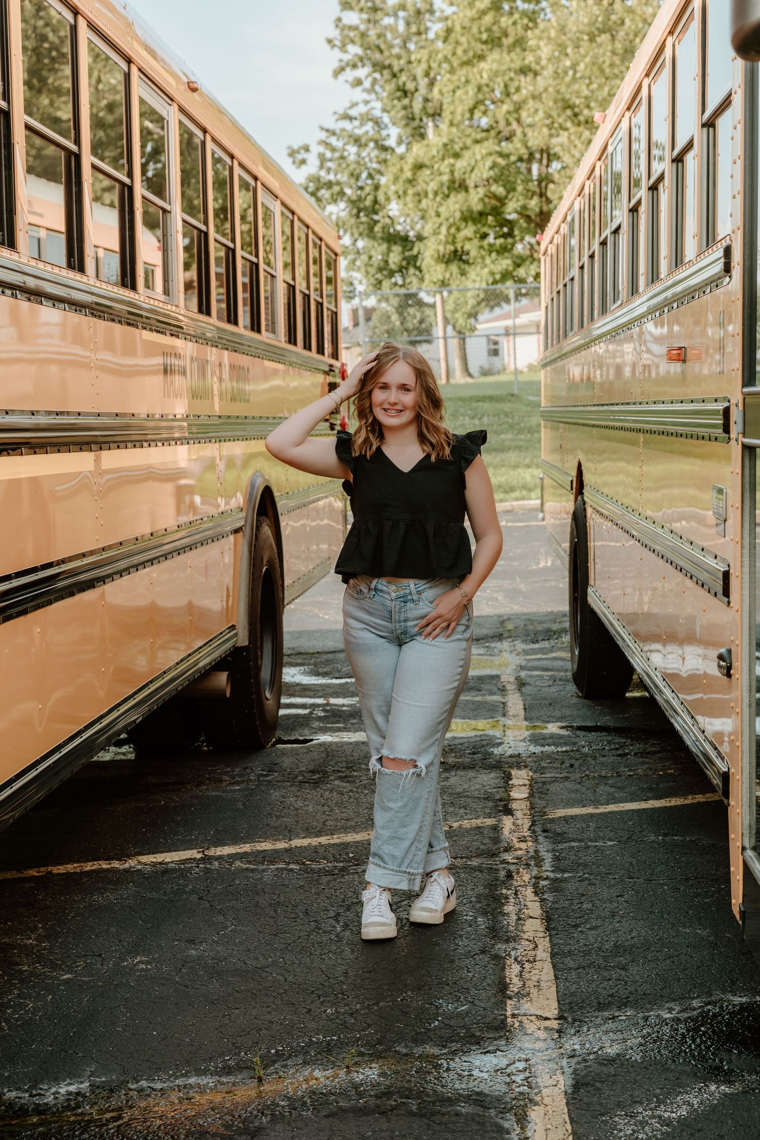 A series of fashion poses against a tan school bus background showcasing casual style in a modern photoshoot.