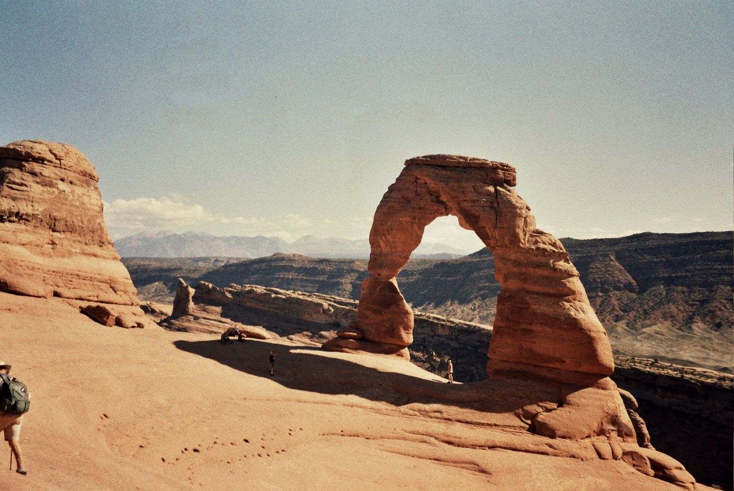 Panoramic sequence of Delicate Arch at different times of day in Arches National Park, Utah.