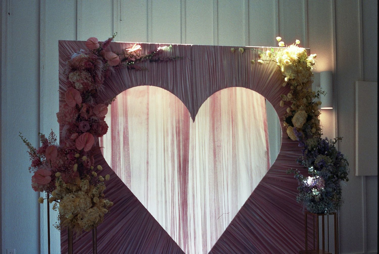 Video chat spans six frames showing different lounging scenes through sheer curtains with natural lighting.