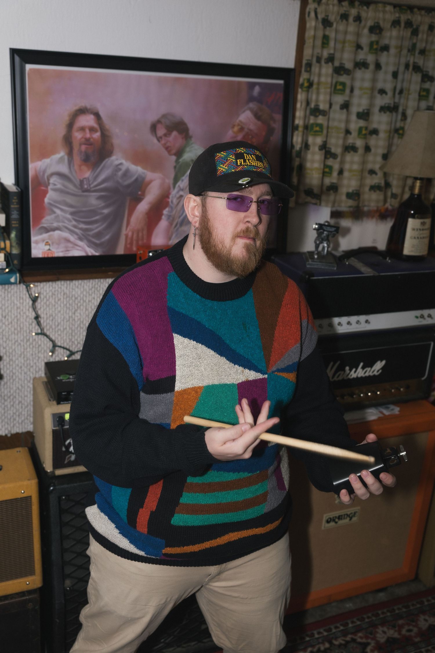 A series of photos showing someone in a colorful striped sweater sitting in a recording studio environment.