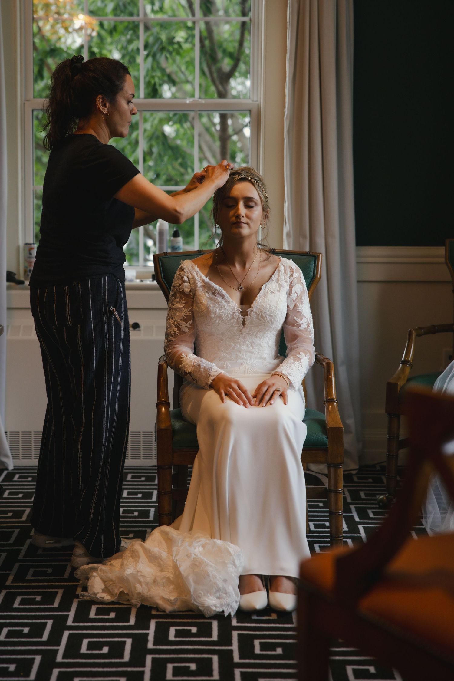Five connected frames show a bride in a lace wedding dress sitting and getting ready in an elegant room with geometric carpet.