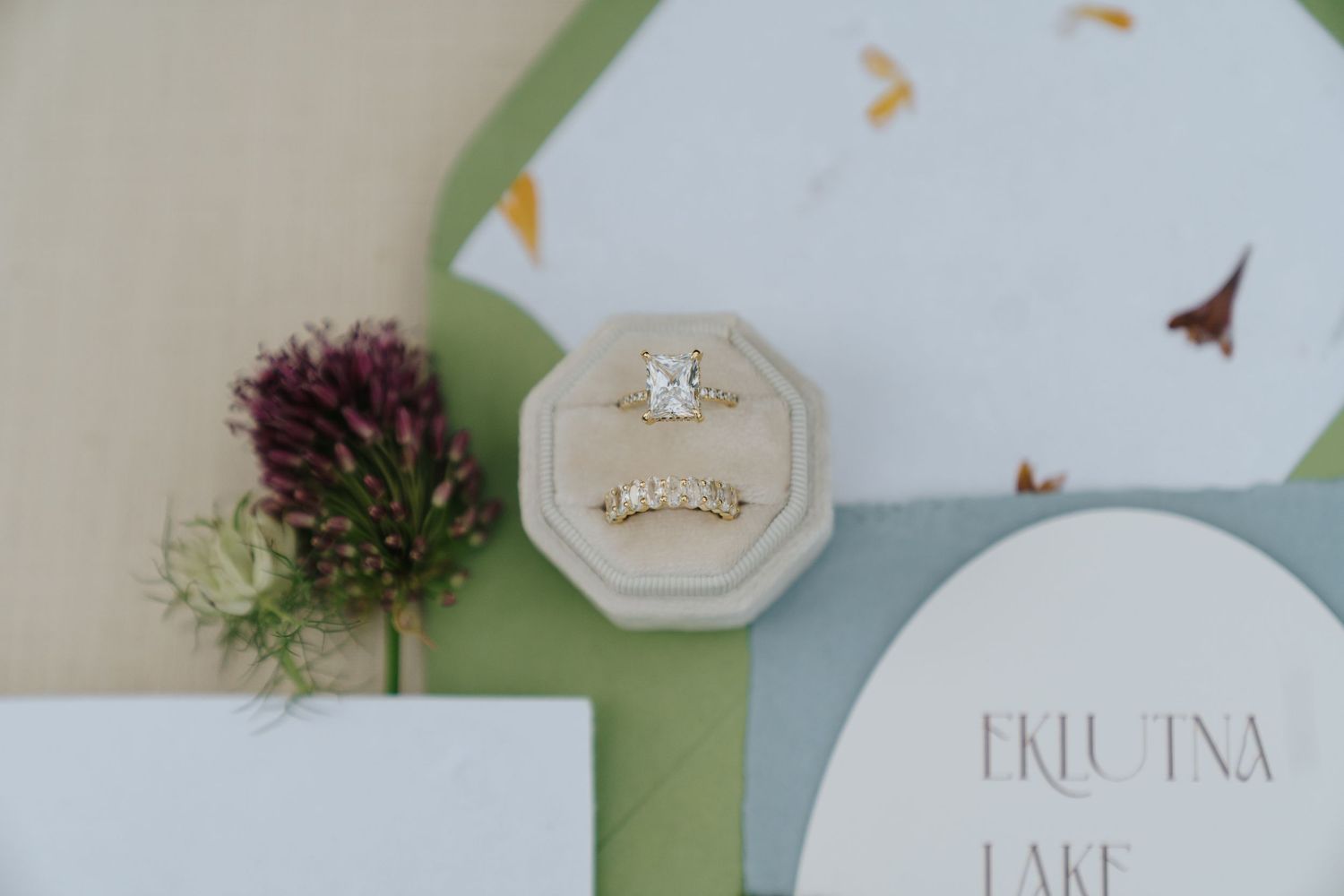 Elegant wedding stationery and decor details in soft pastel tones.