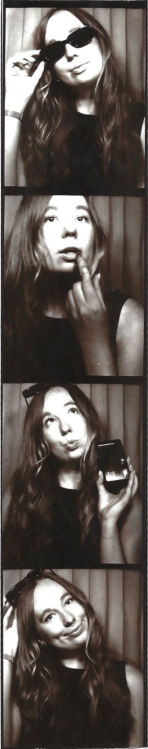 Vintage-style photo booth strip with multiple expressive black and white portraits.