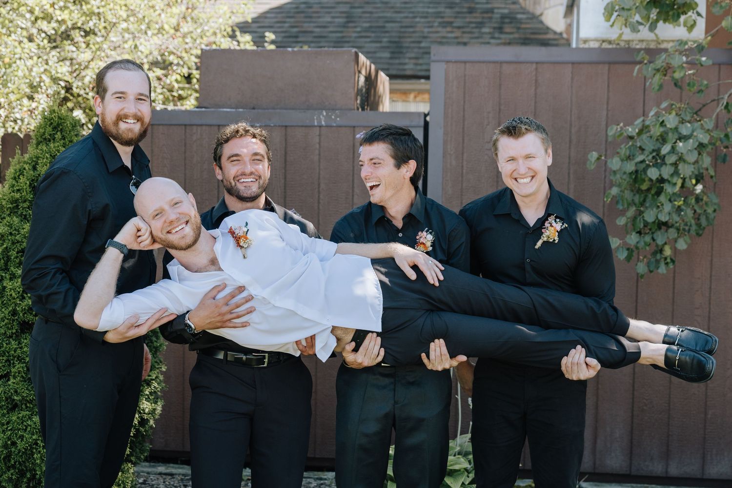 A series of five candid wedding party photos showing playful and fun group poses outdoors.