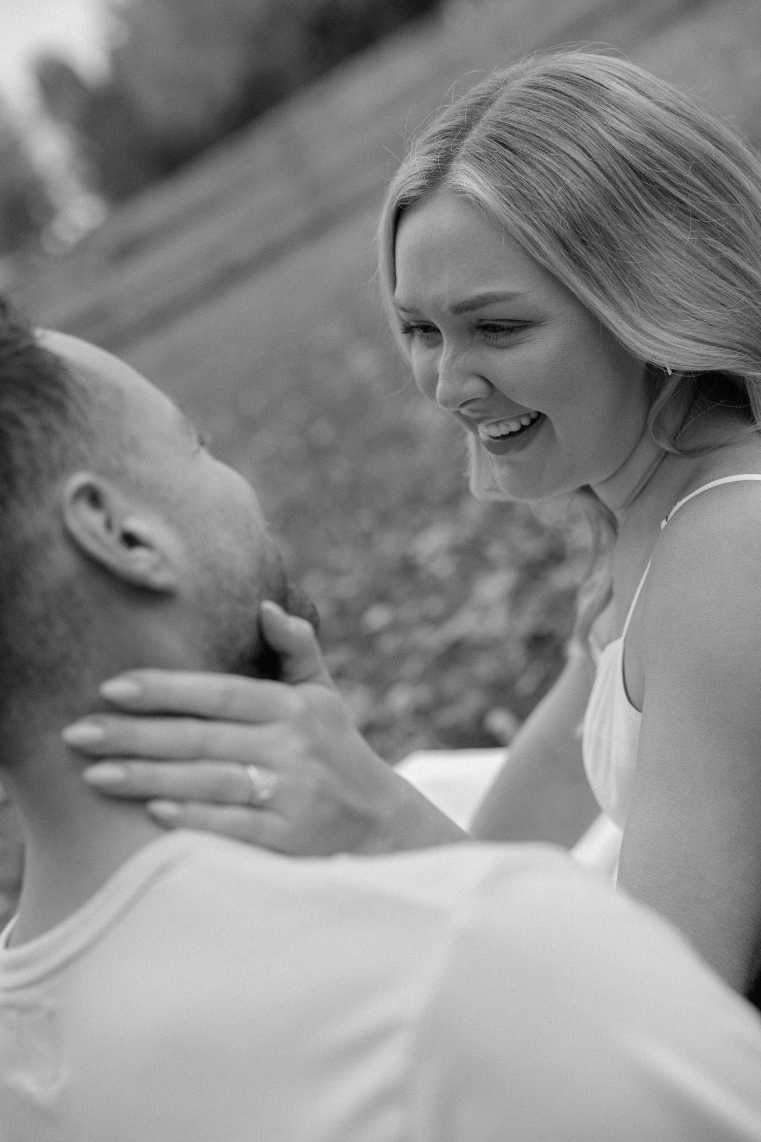 A series of black and white close-up shots showing emotional expressions and reactions.