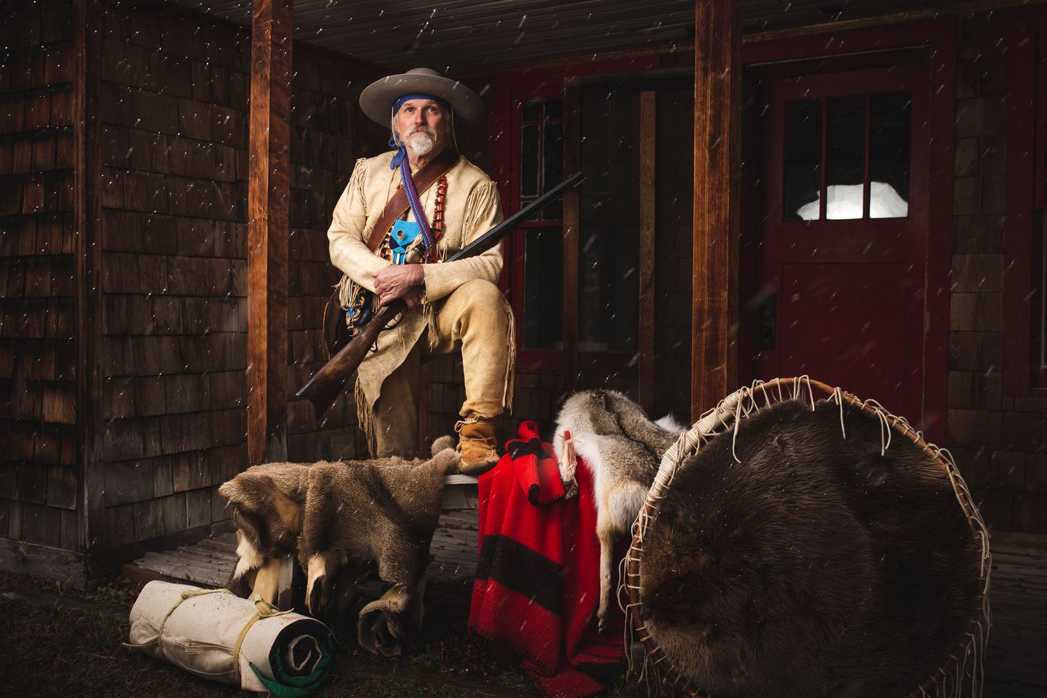 A dramatic scene set in a rustic barn interior with vintage-style lighting.