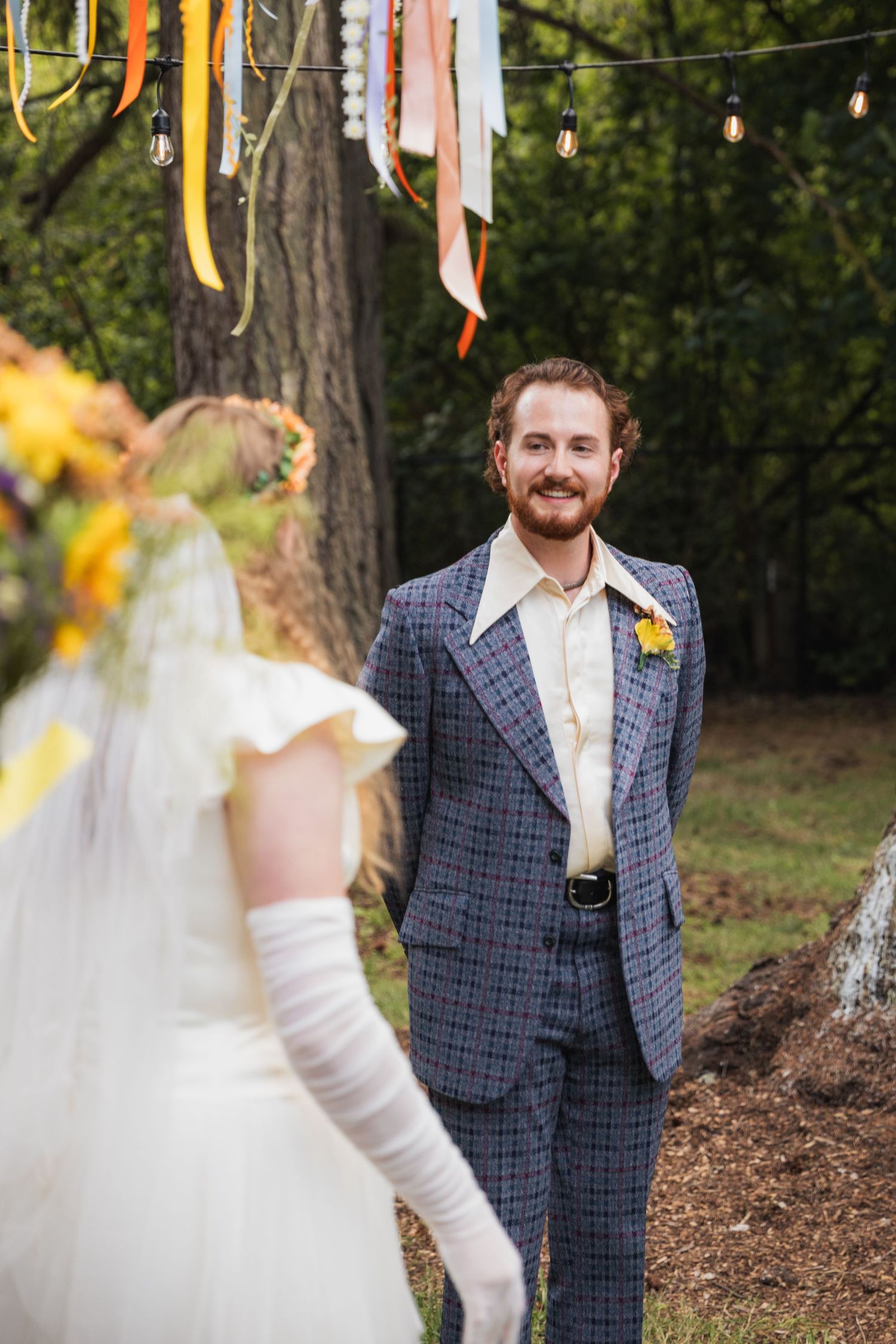 A series of wedding photos showing a couple in a wooded outdoor setting with string lights and rustic decor.