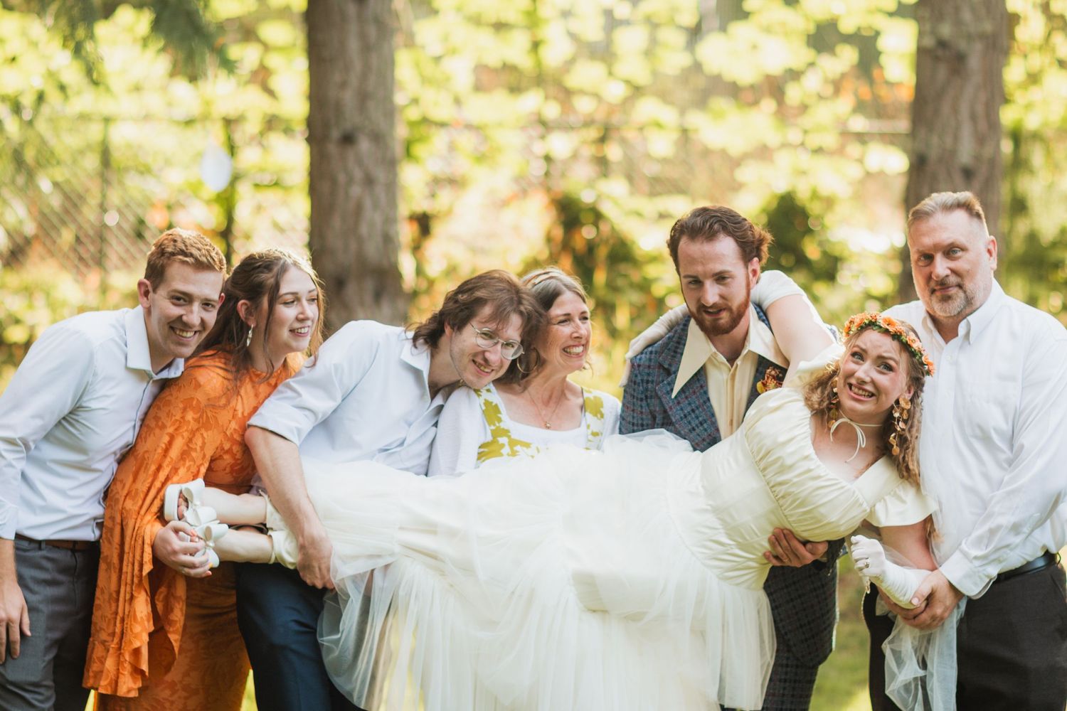 A series of candid outdoor wedding photos showing joyful moments between couples in natural lighting.
