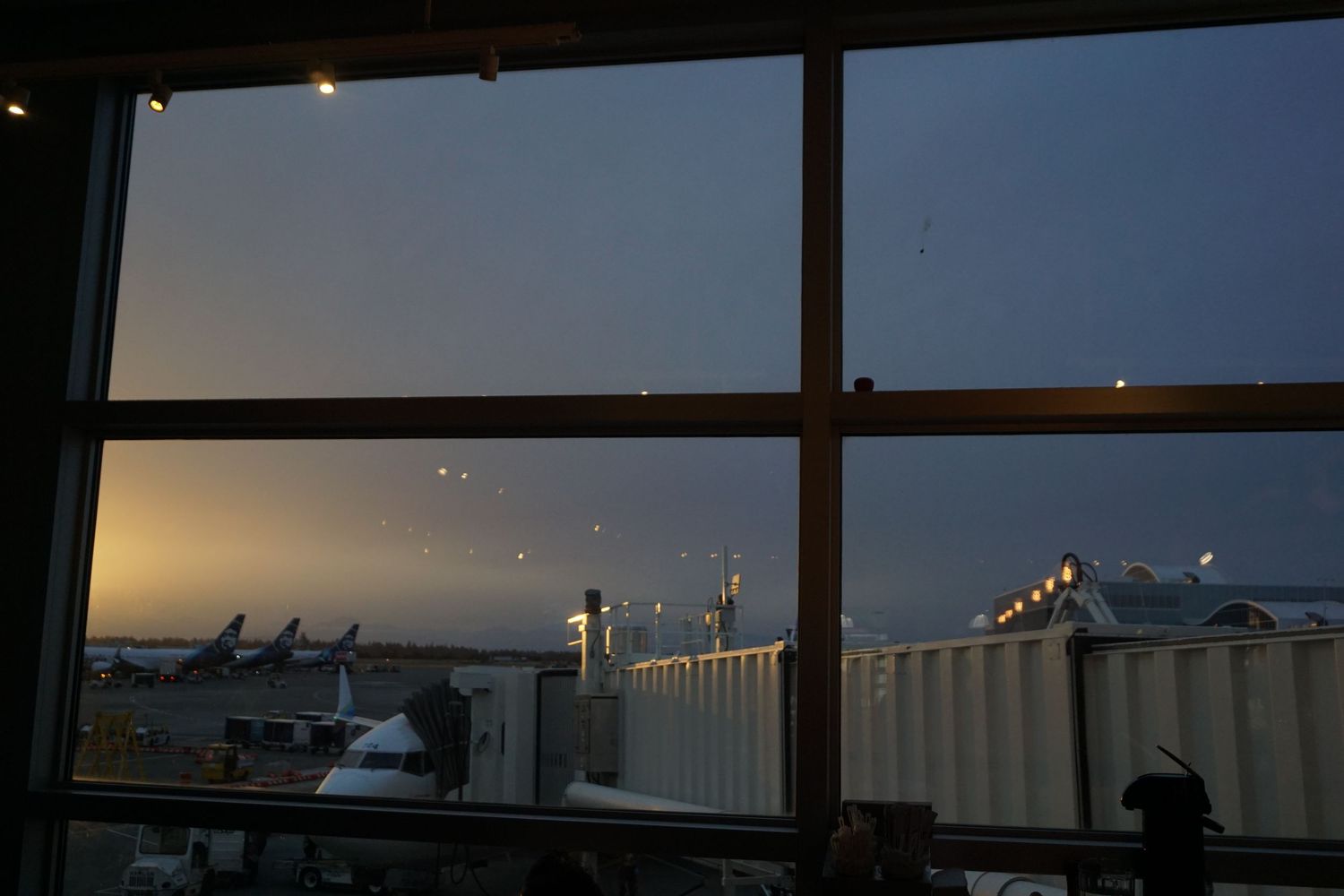 Sunrise image inside an airport. Image is talked about in blog attached, speaking about traveling while working.