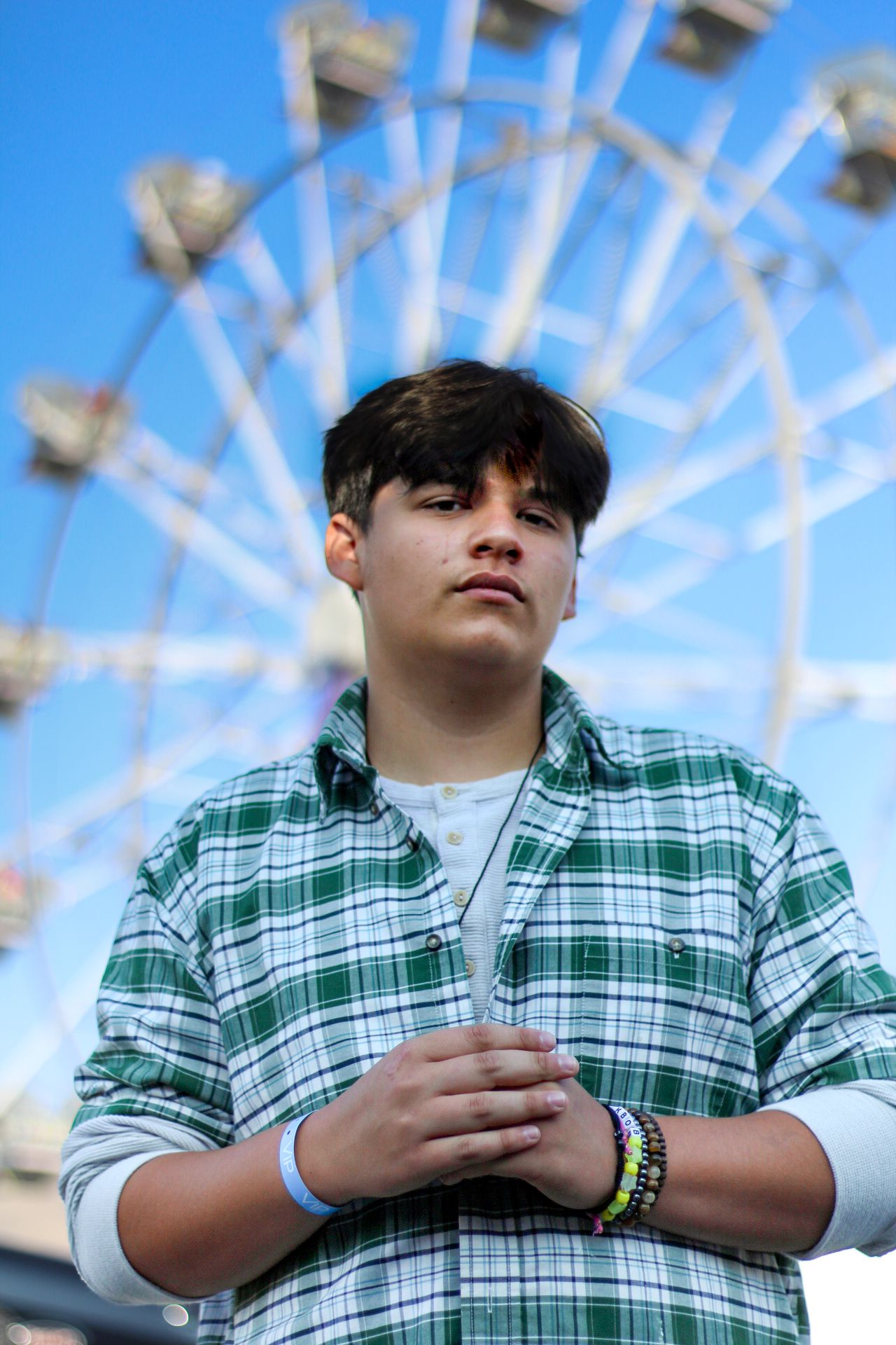 Missoula, Mt Graduate Senior Portrait, outside at fairgrounds with Ferris Wheel and blue sky in background
Kayla Sproles Photography 2024