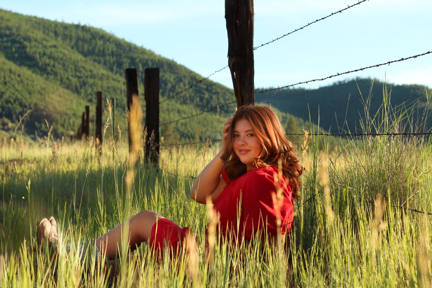 Missoula, Mt Graduate Senior Portrait, outside in a meadow 
Kayla Sproles Photography 2024