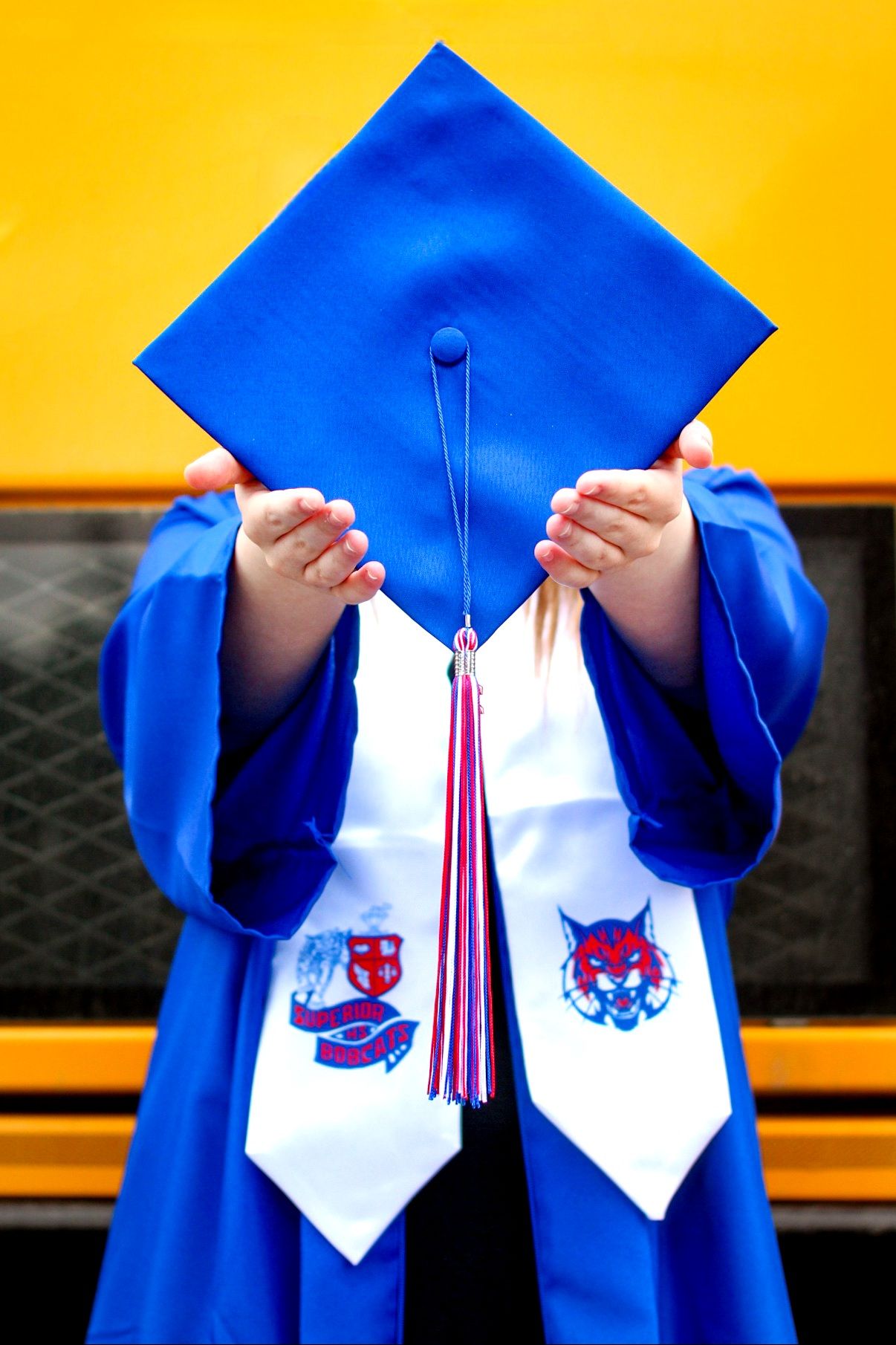 Superior, Mt Graduate Senior Portrait, outside wearing cap and gown
Kayla Sproles Photography 2024