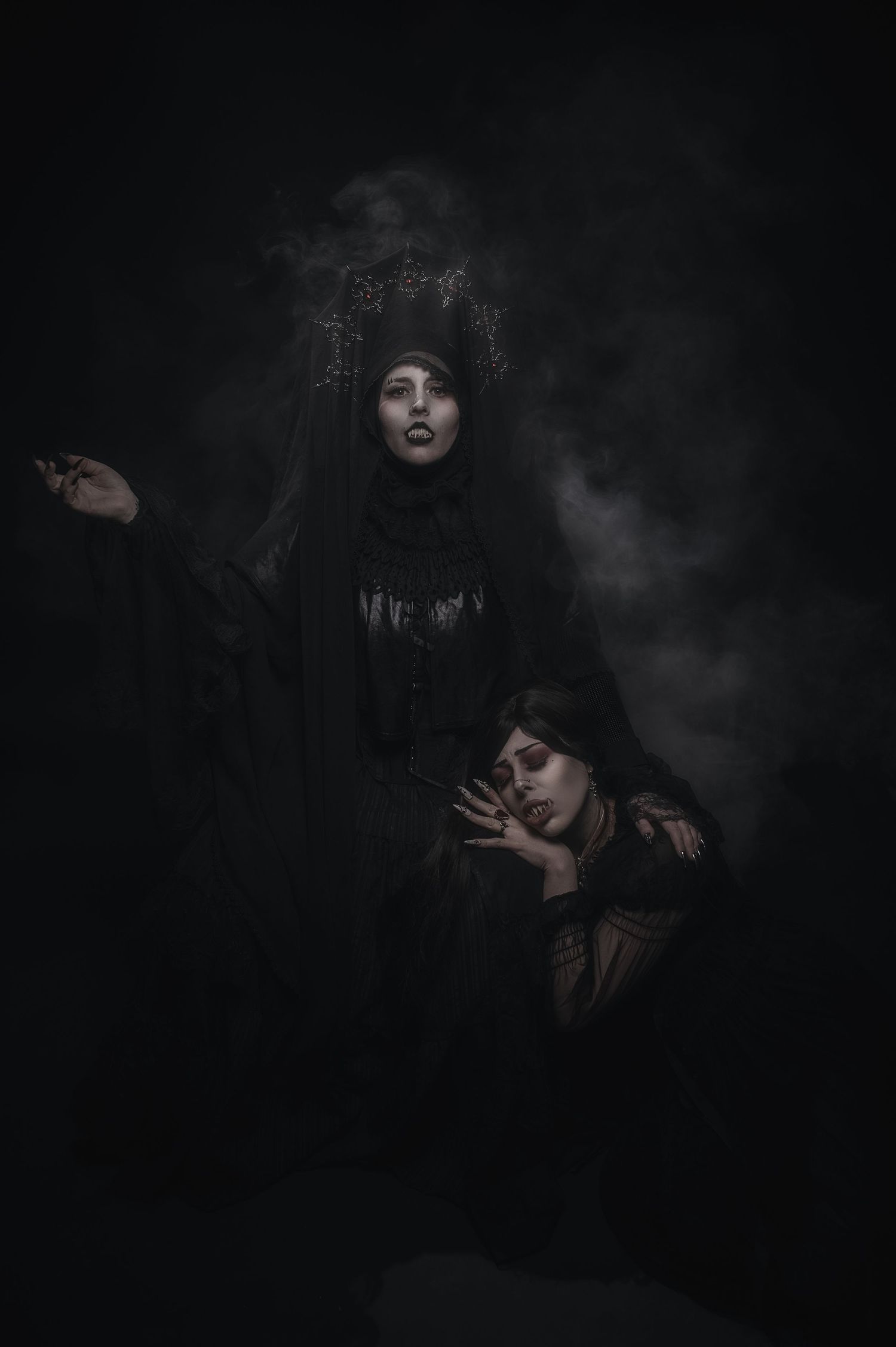 Gothic figure emerging from dark smoke in dramatic theatrical lighting.