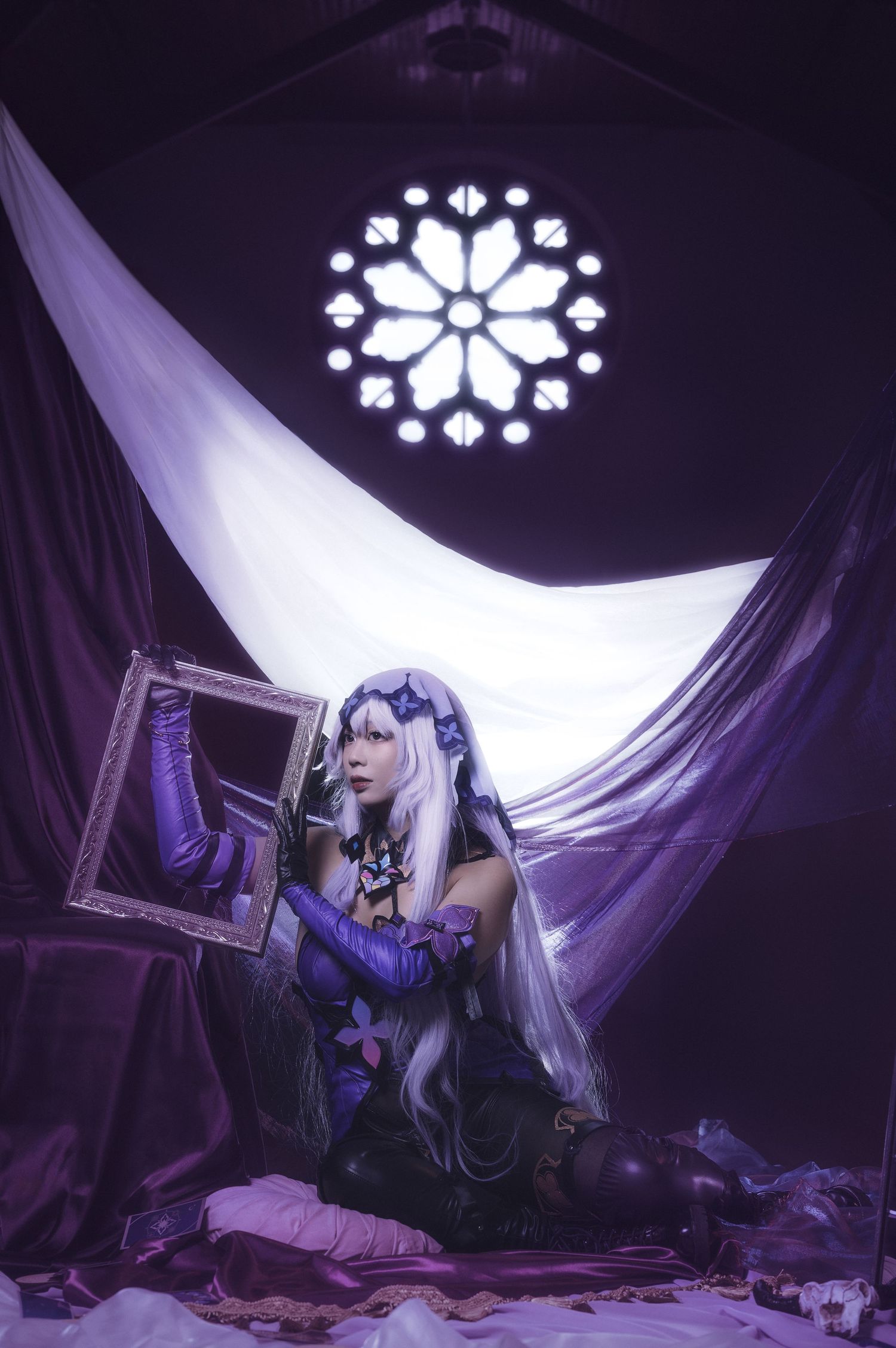 Gothic fantasy scene with stained glass window and flowing purple fabric in dark setting.