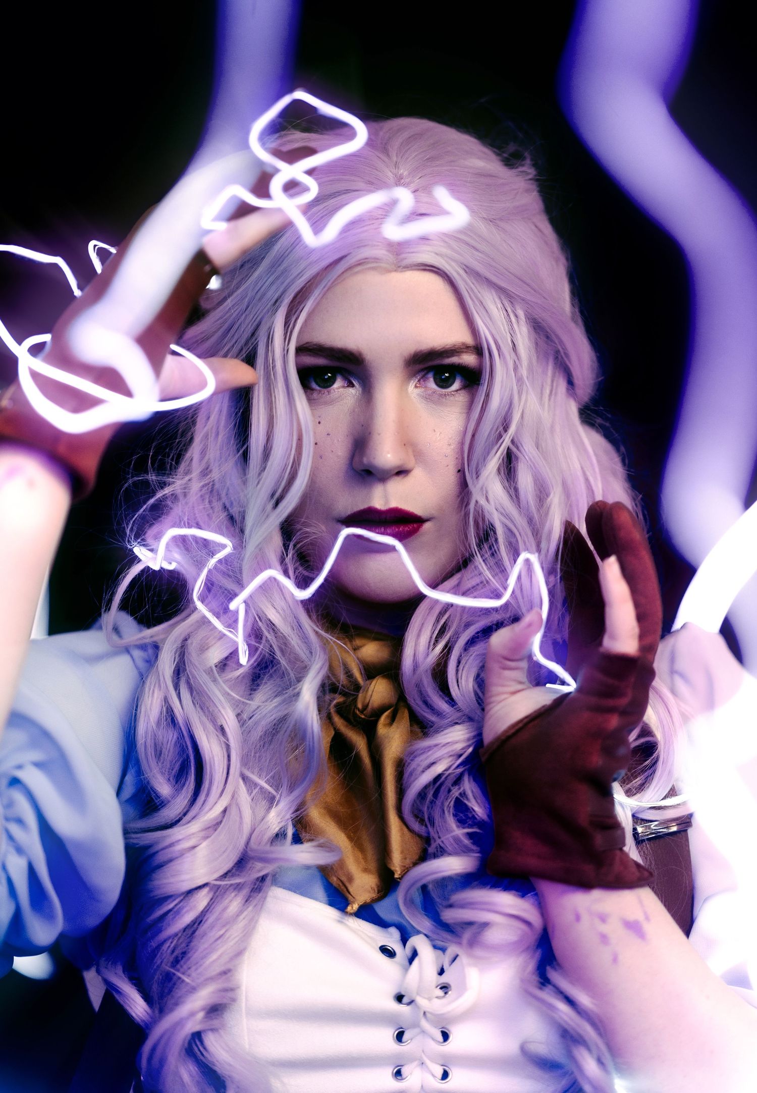 Ethereal portrait with purple lighting effects and flowing white hair.
