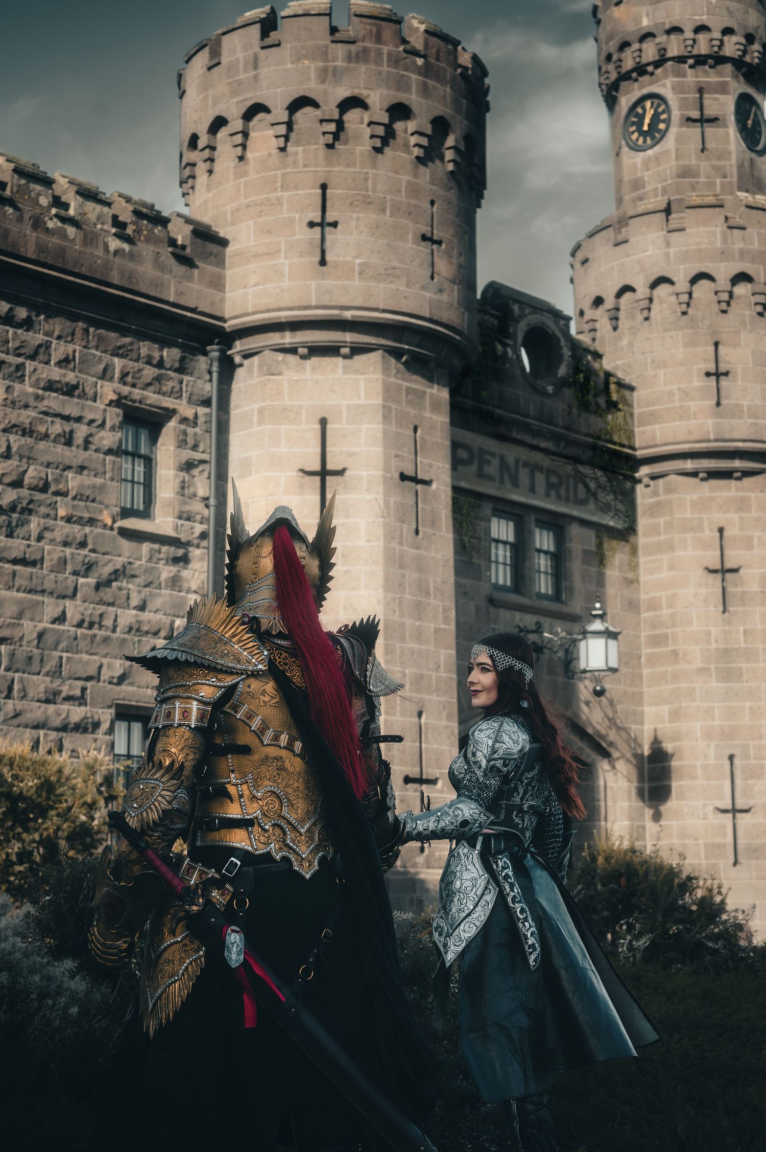 Knights in ornate armor pose dramatically against a medieval castle with turrets.
