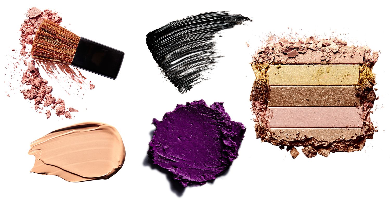 Crushed blush, mascara smear, eyeshadow palette, foundation swatch, purple eyeshadow, and highlighter palette makeup product swatches.