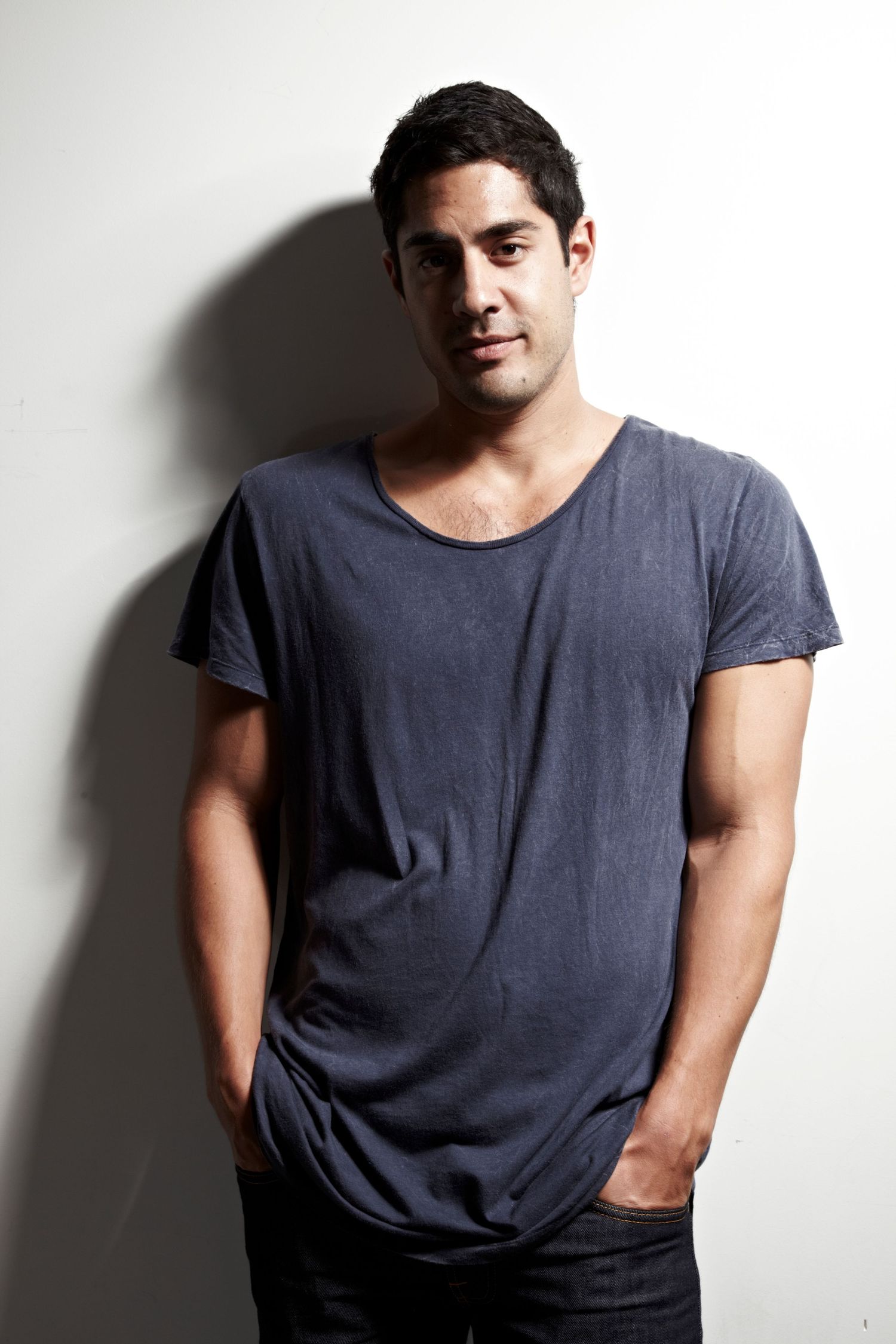A casual portrait series showing someone in a grey t-shirt against a white background.