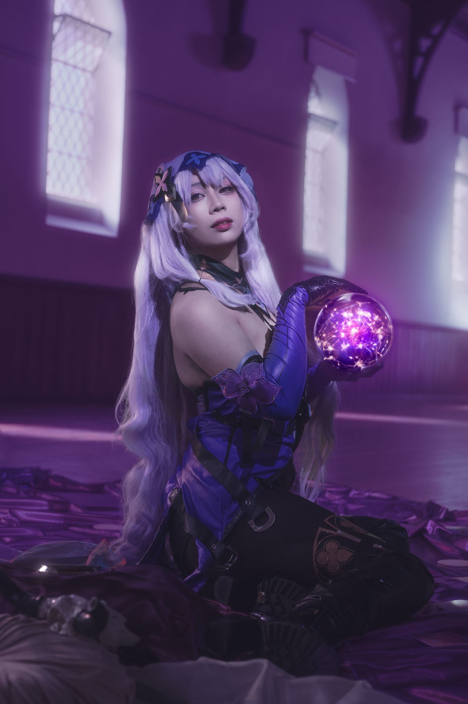Mystical fantasy portrait with glowing orb and purple atmospheric lighting.