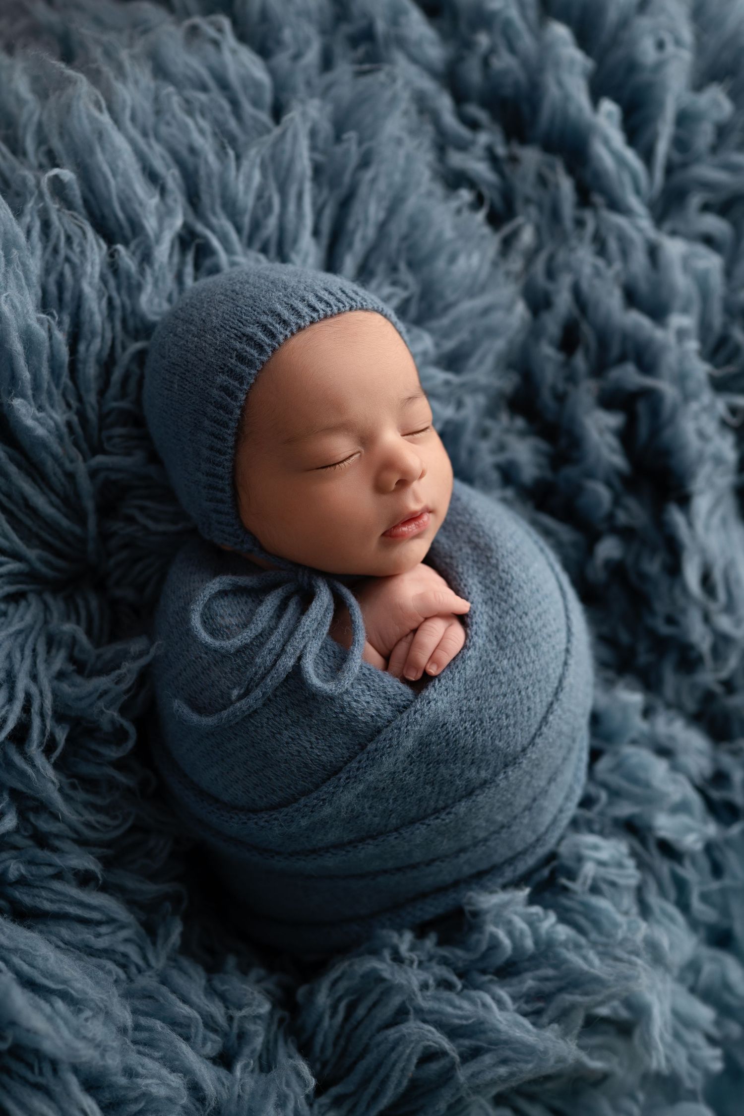 Posed newborn photography in The Woodlands, TX